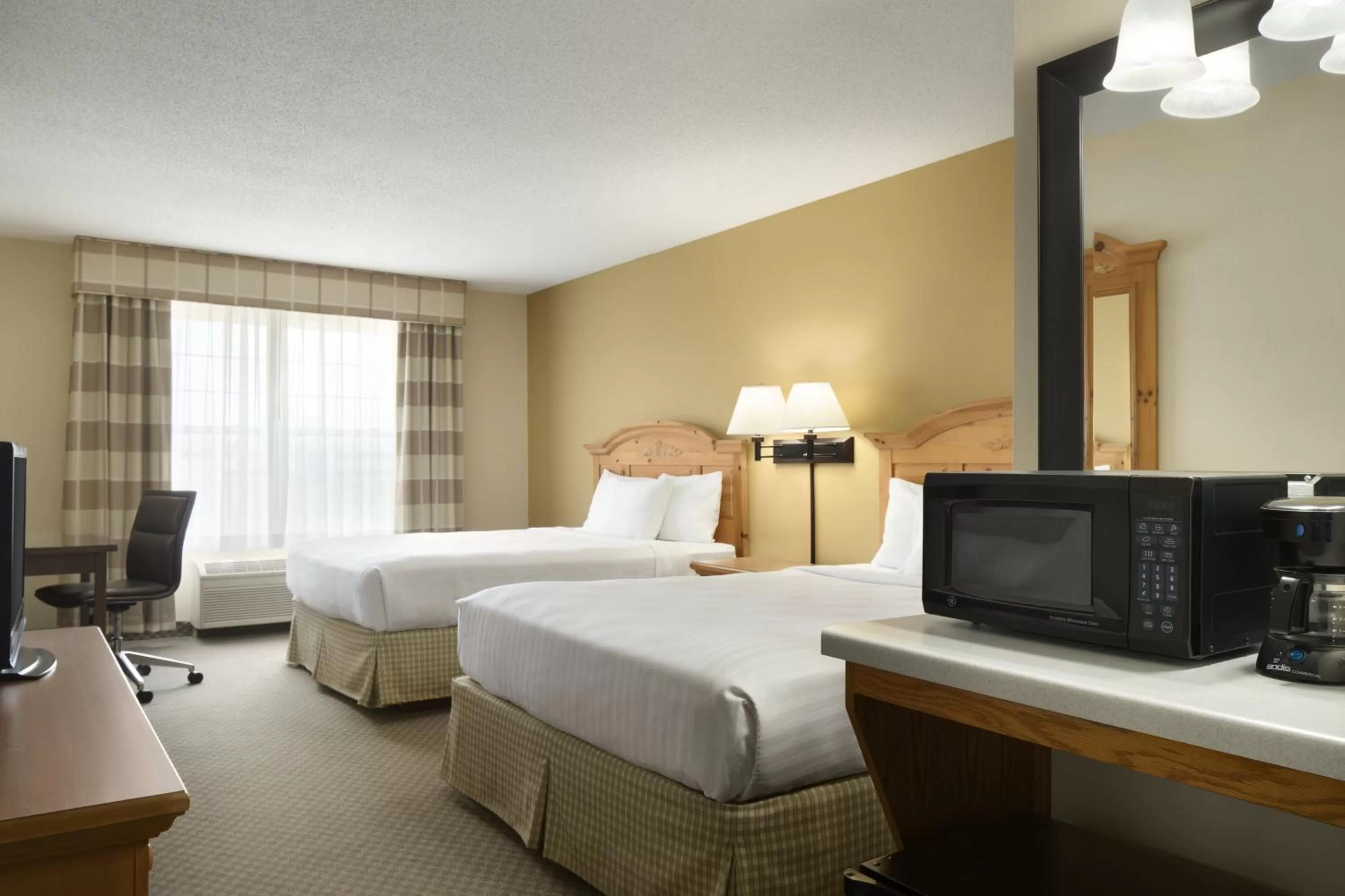 Photo of the whole room, Bed in Country Inn & Suites by Radisson, Grinnell, IA