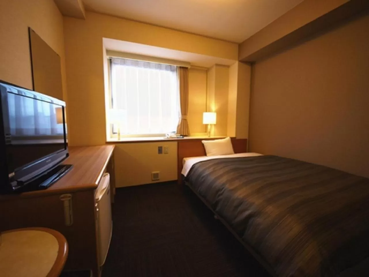 Photo of the whole room, Bed in Route Inn Grantia Fukuyama Spa Resort