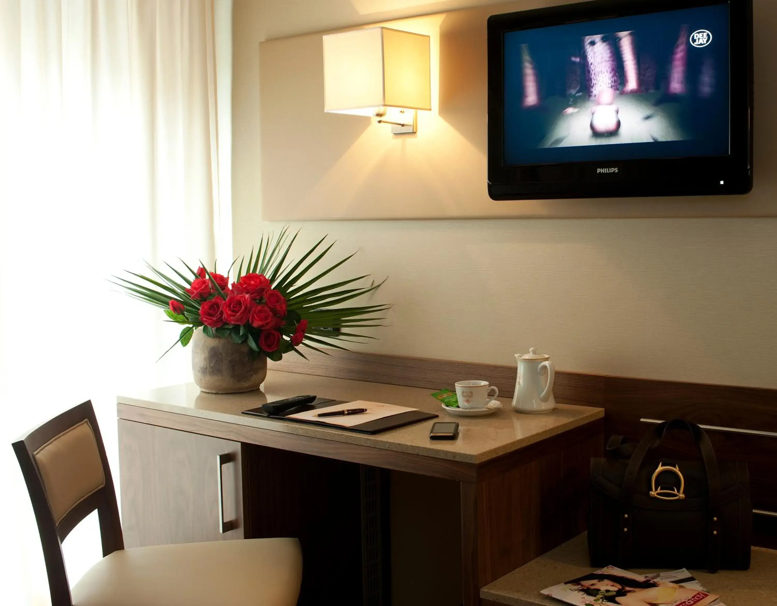 TV and multimedia, TV/Entertainment Center in Hotel Fenice