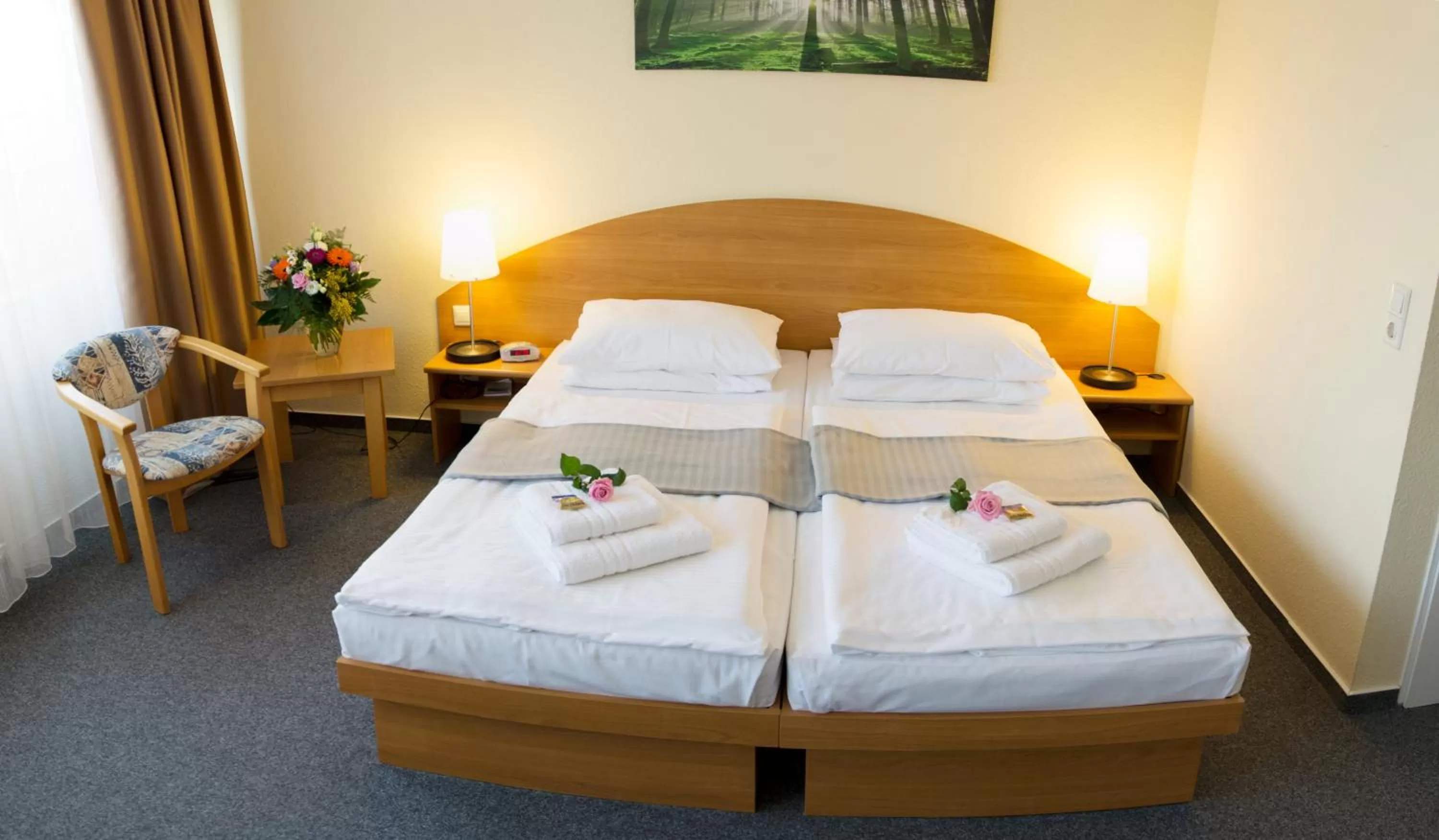 Bed in astral'Inn Leipzig Hotel & Restaurant