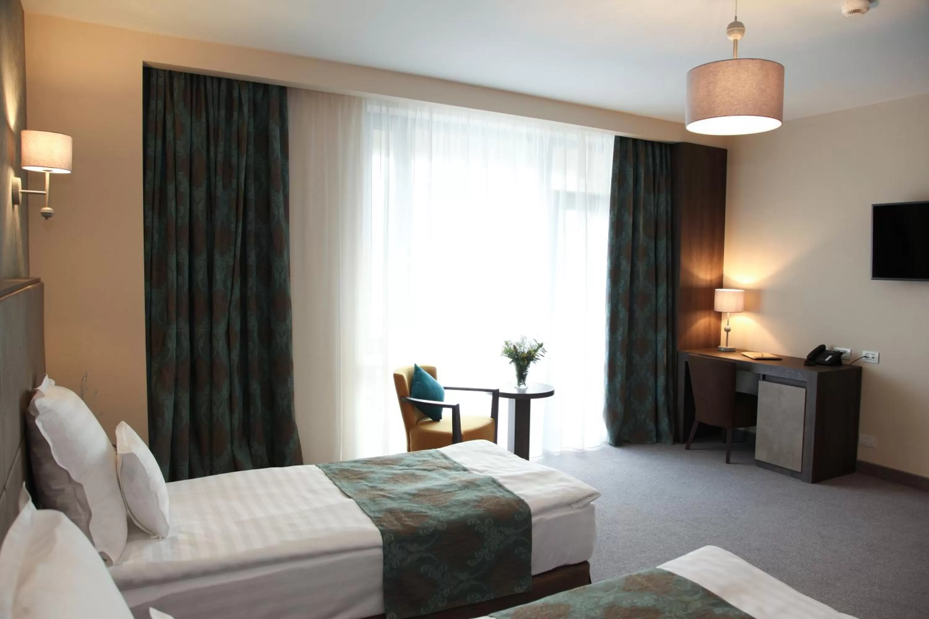 Photo of the whole room, Bed in Victoria Bulevard Hotel