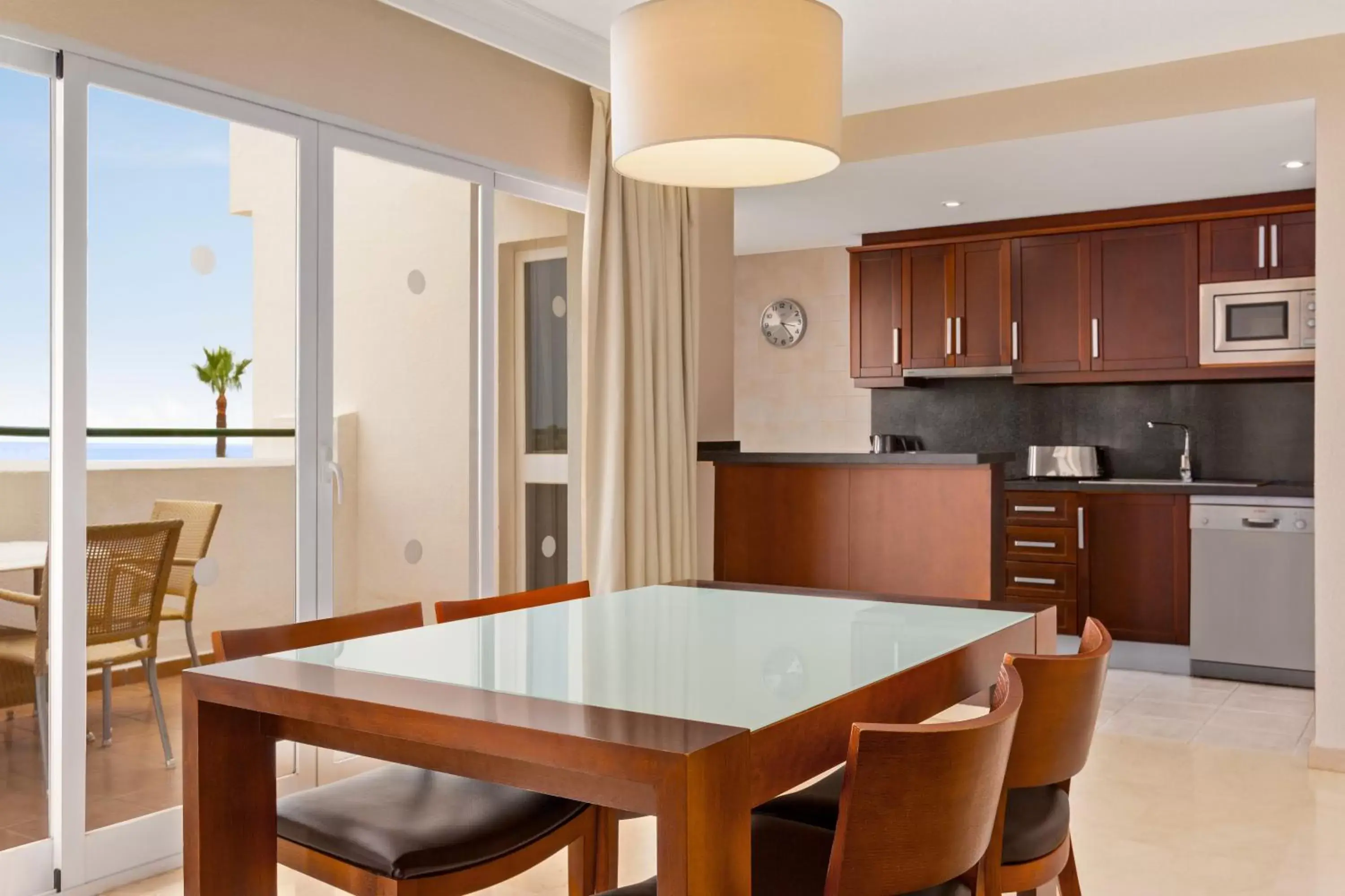 Kitchen or kitchenette, Dining Area in Ramada Hotel & Suites by Wyndham Costa del Sol