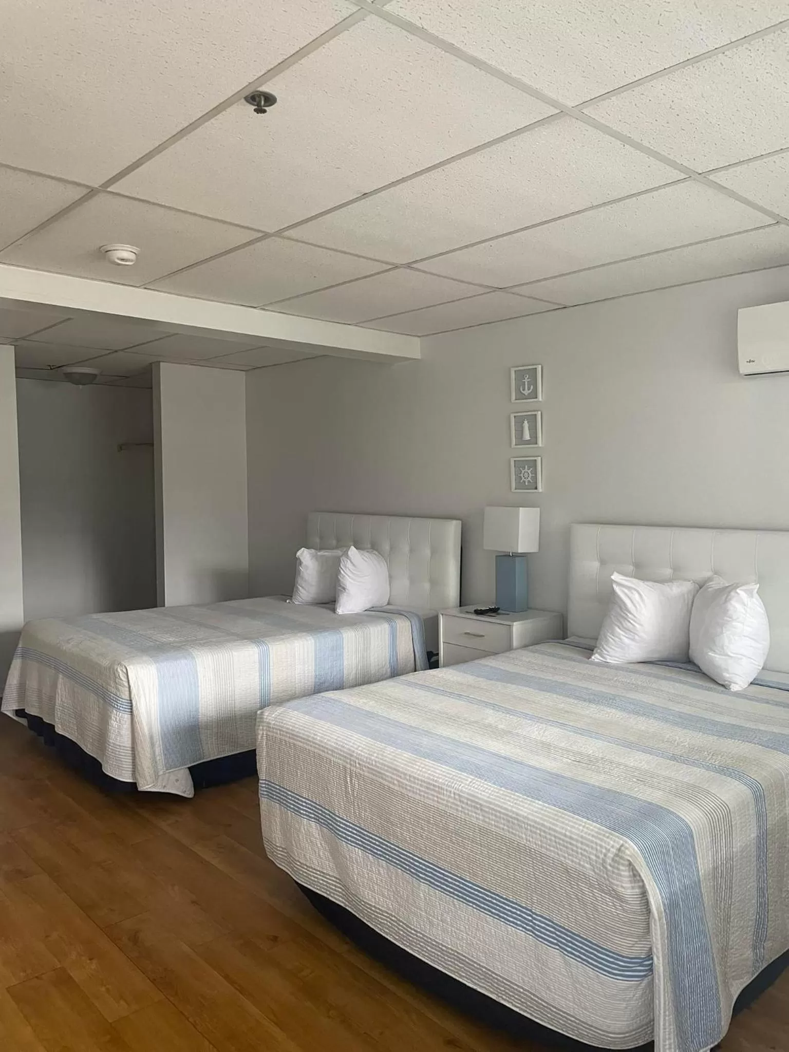 Bed in The Grand Beach Inn