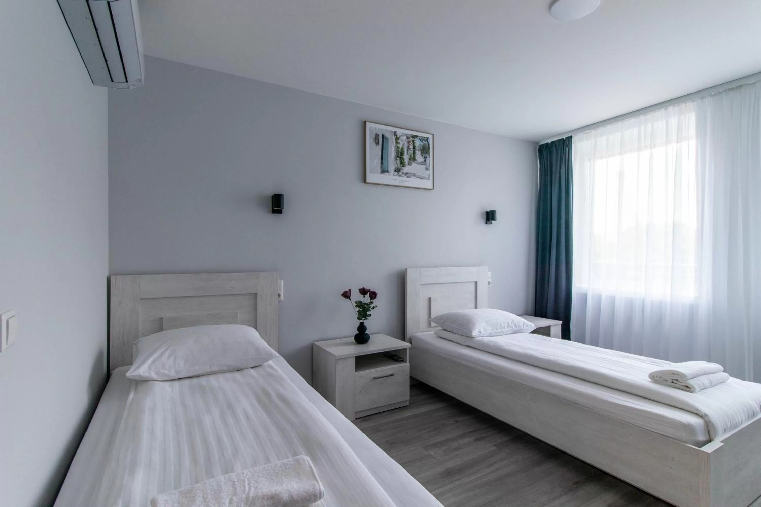 Bed in Dzukija Hotel