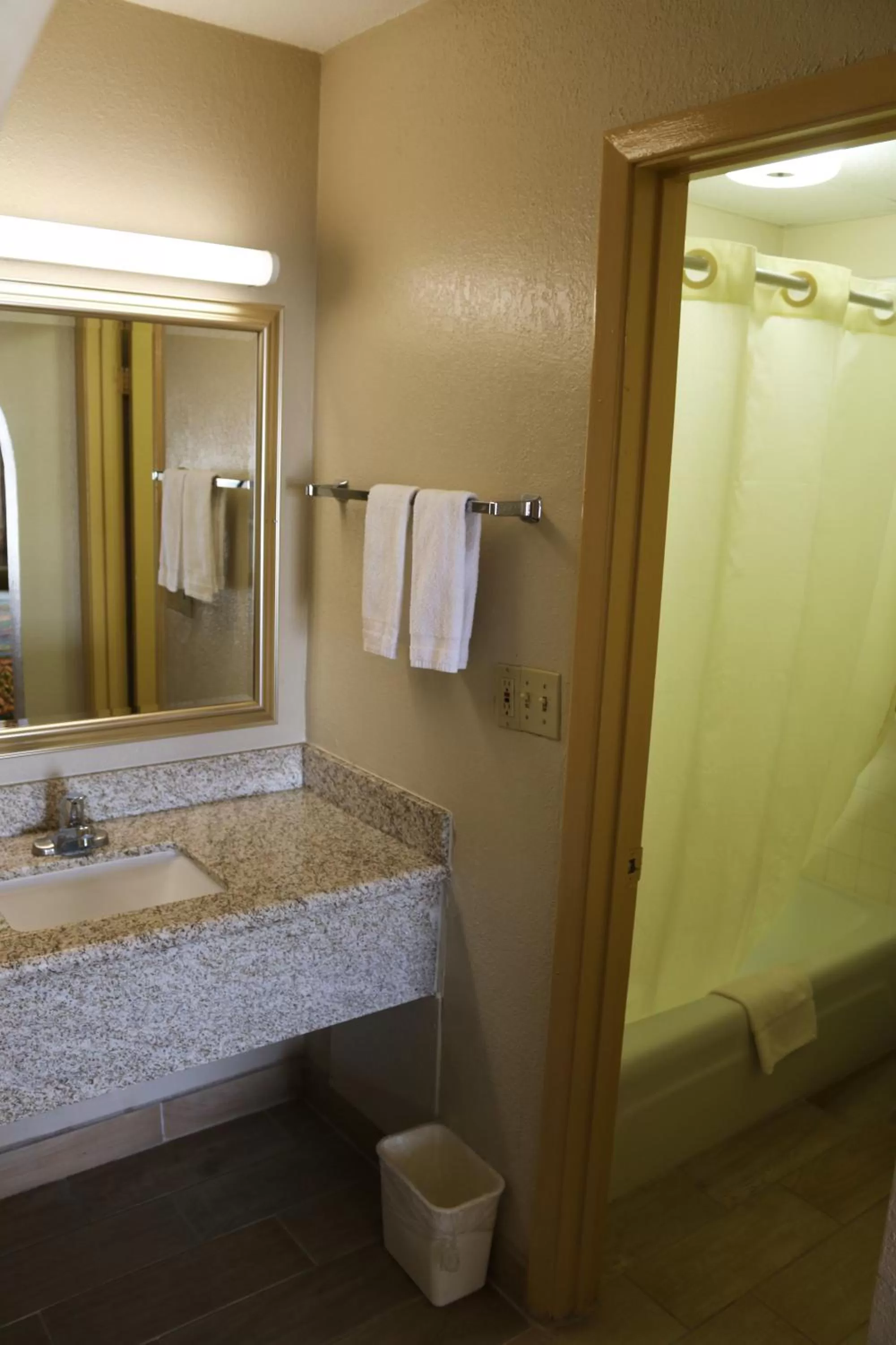 Bathroom in Great Western Inn & Suites