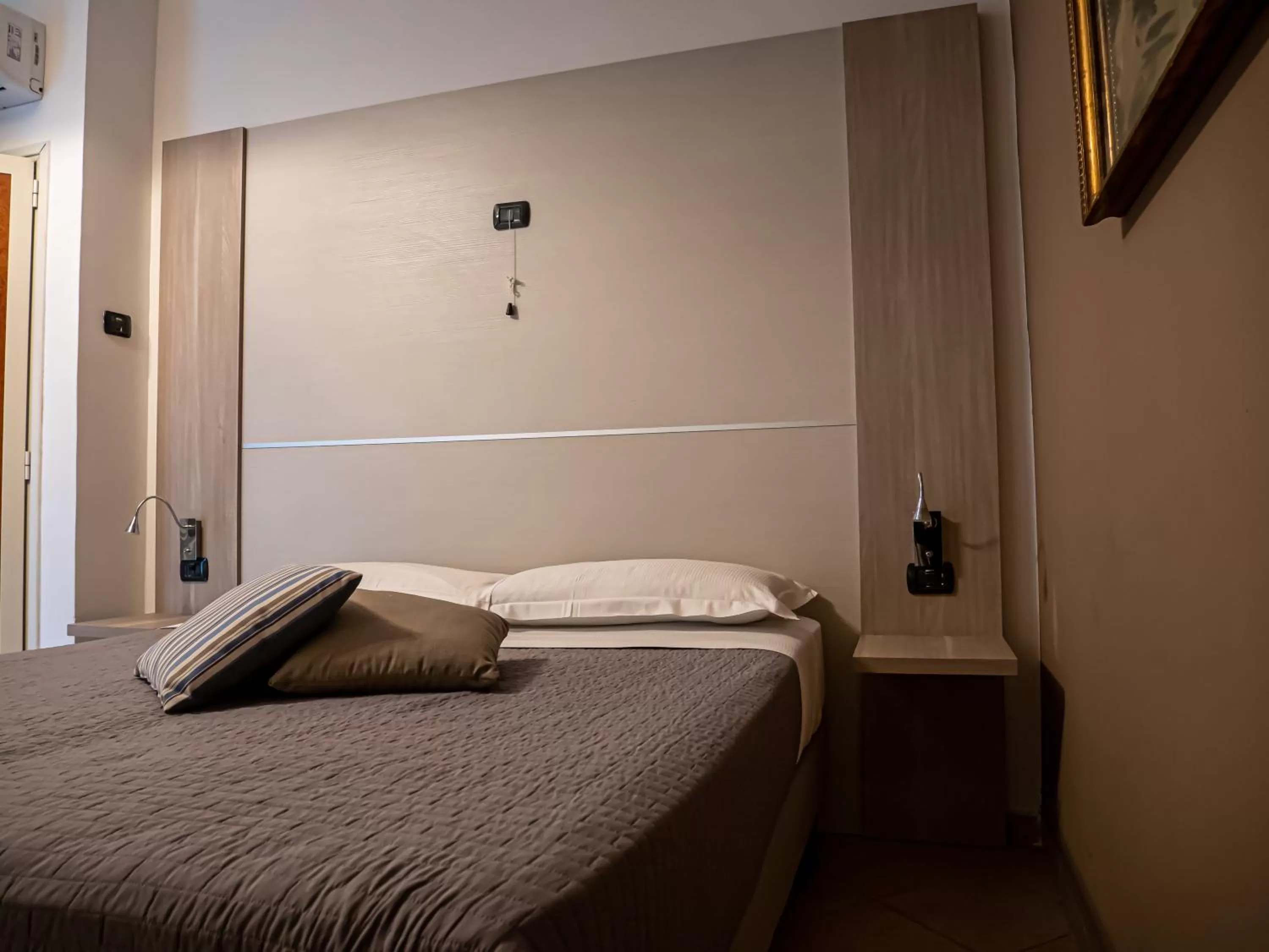 Bed in San Marco Hotel