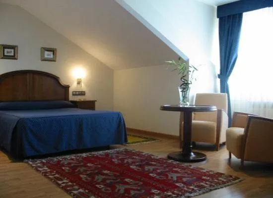 Photo of the whole room, Bed in Hotel Cristina