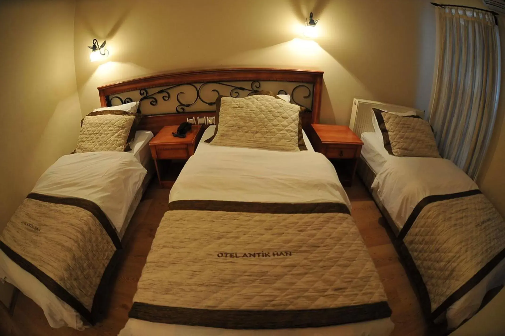 Bed in Antikhan Hotel
