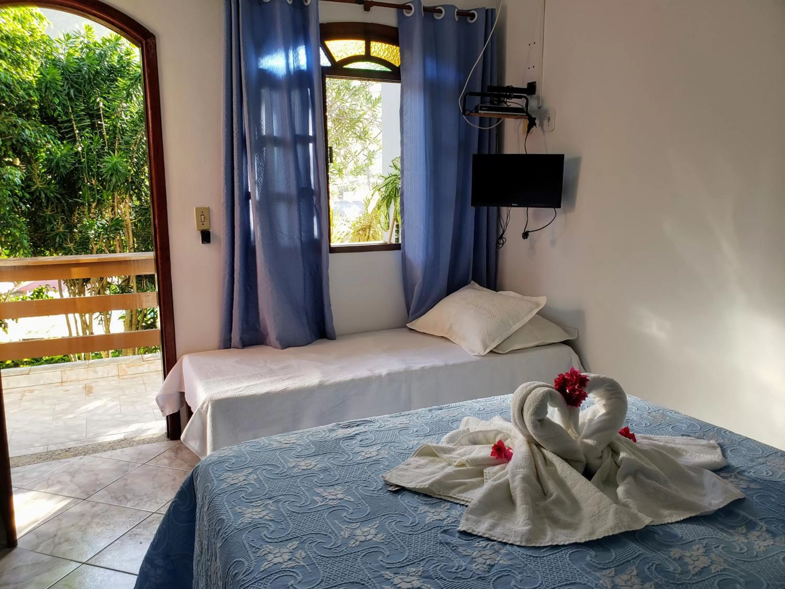 Bed in Pousada Recanto Das Emerências