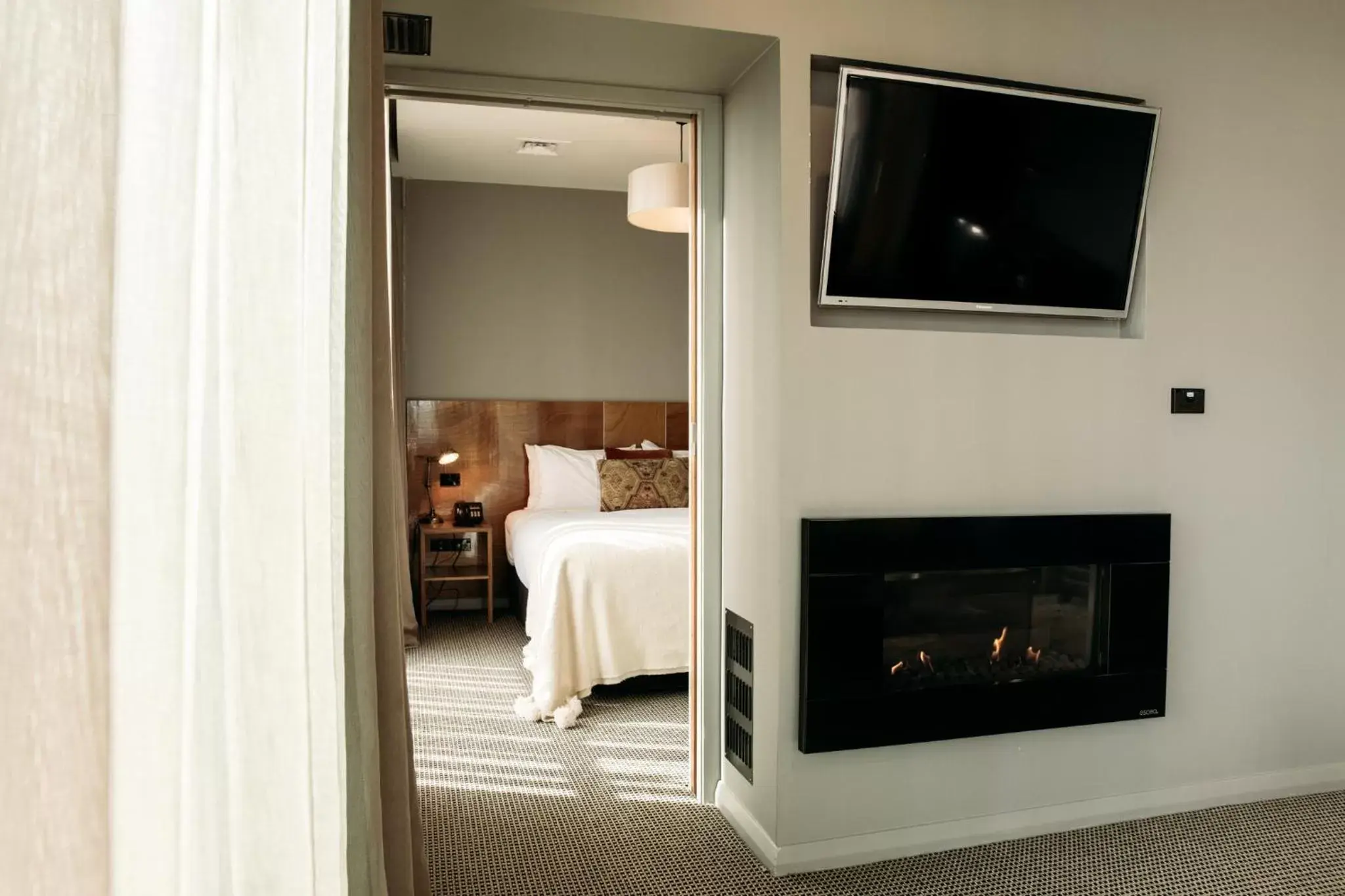 Living room, TV/Entertainment Center in King and Queen Hotel Suites
