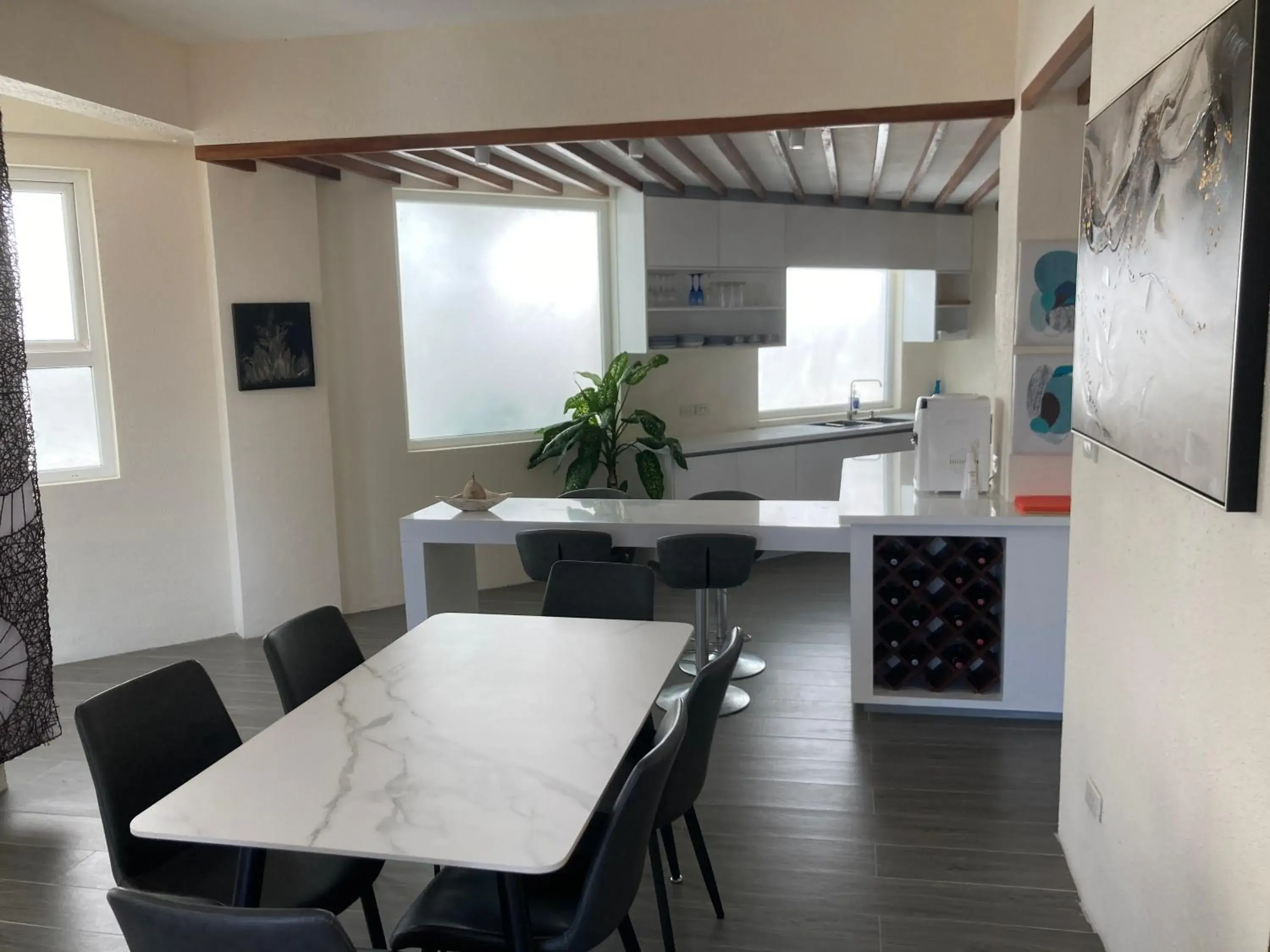 Kitchen or kitchenette, Dining Area in Sunset At Aninuan Beach Resort