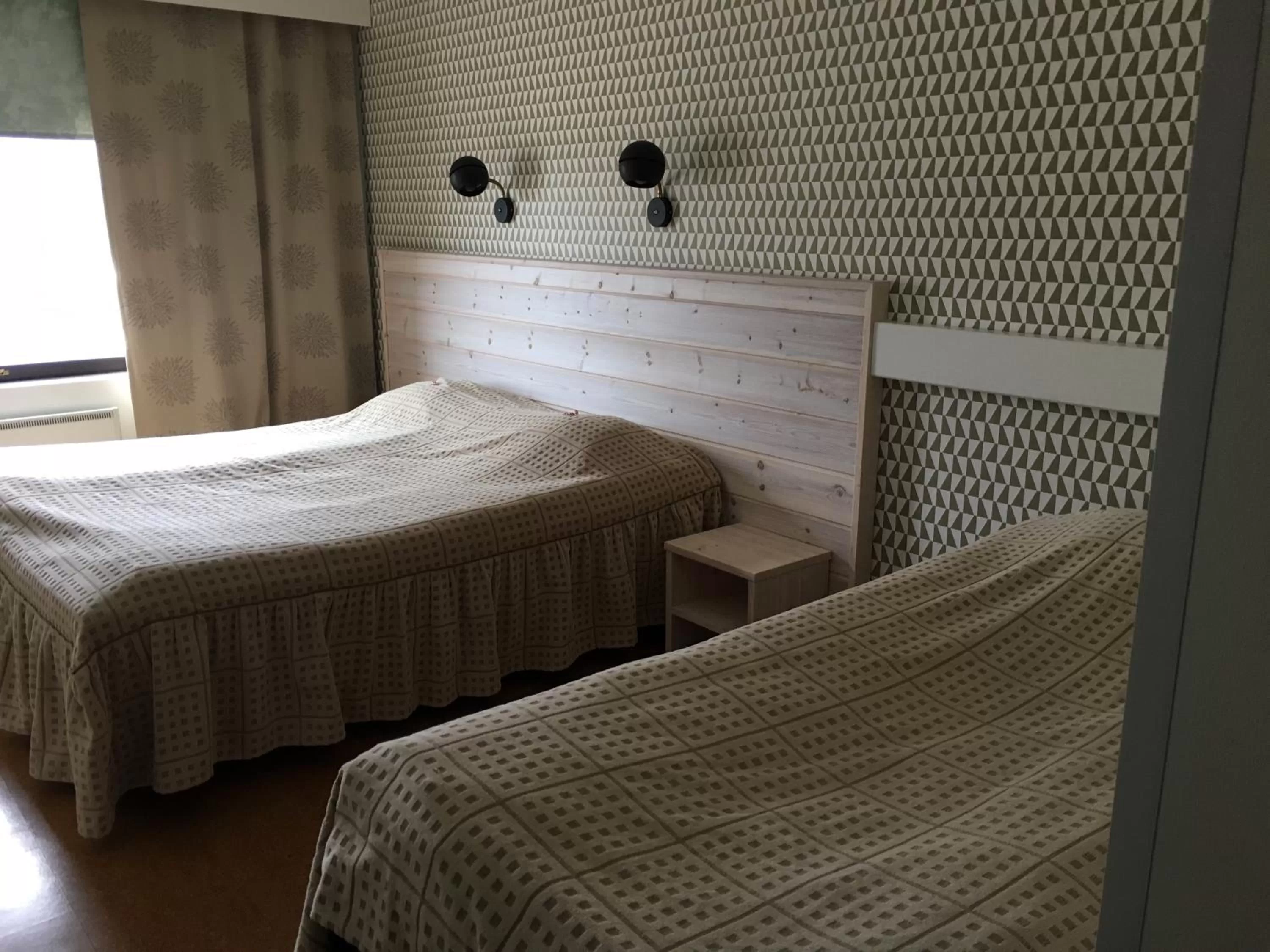 Bed in Hotelli Pellonhovi