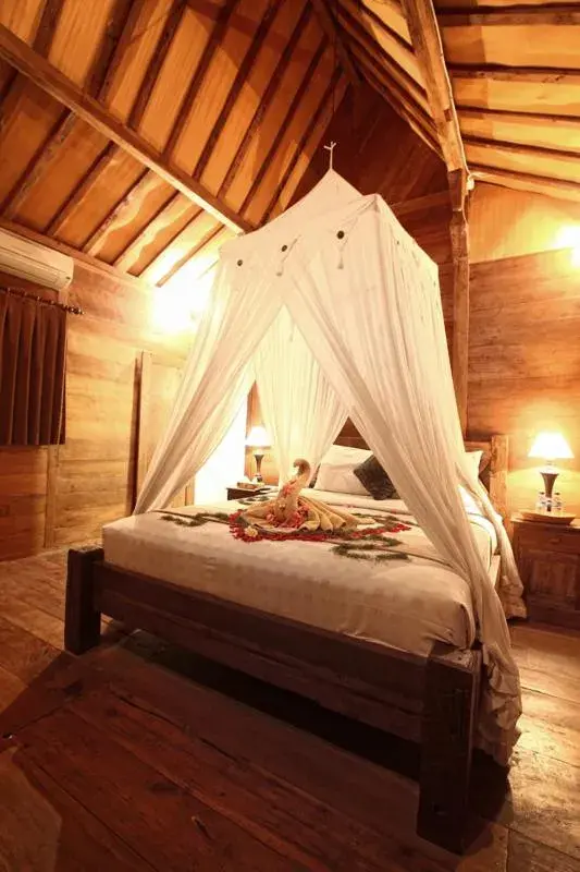Bed in Villa Mandi Ubud