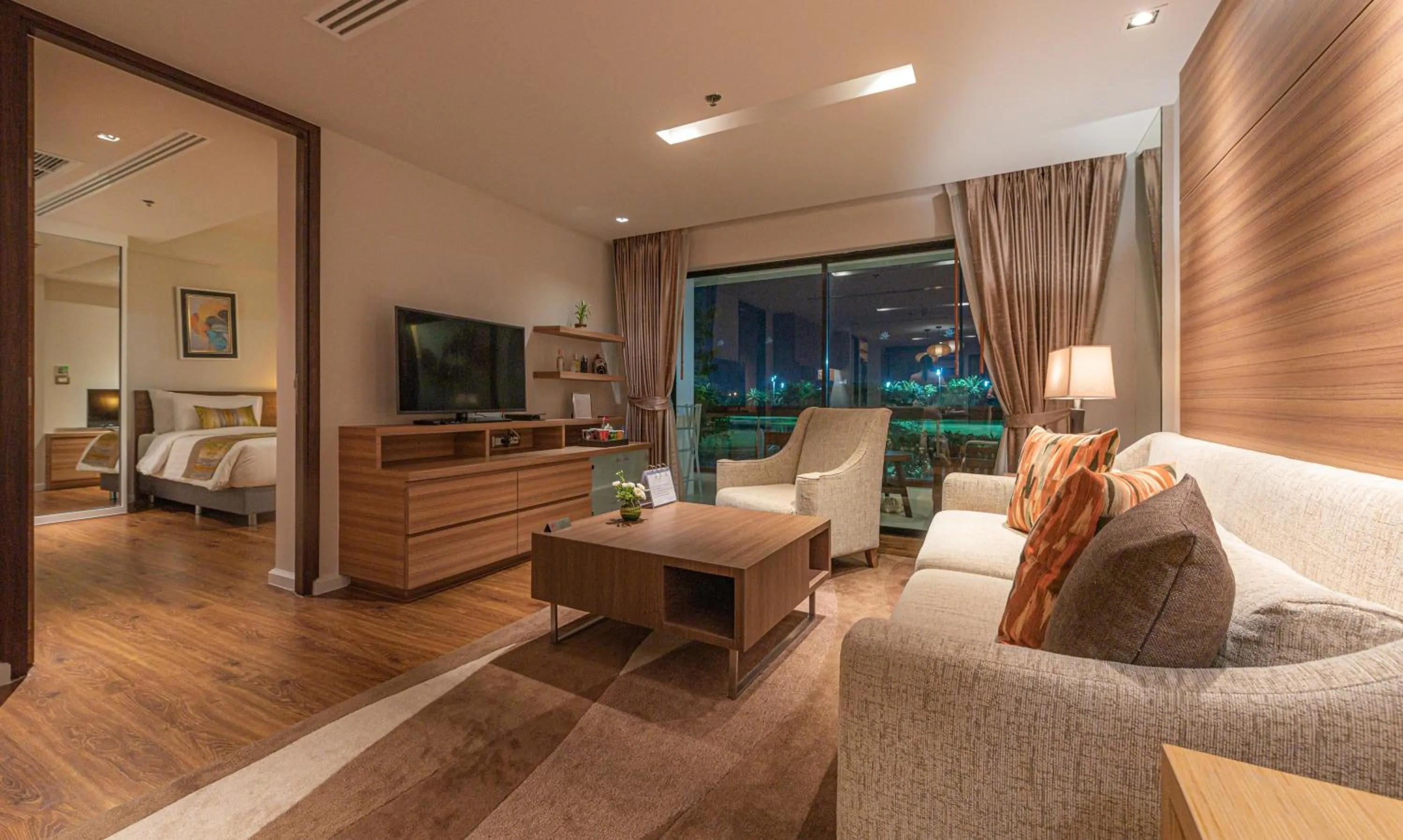 Living room in Summit Windmill Golf Suite Hotel at Suvarnabhumi