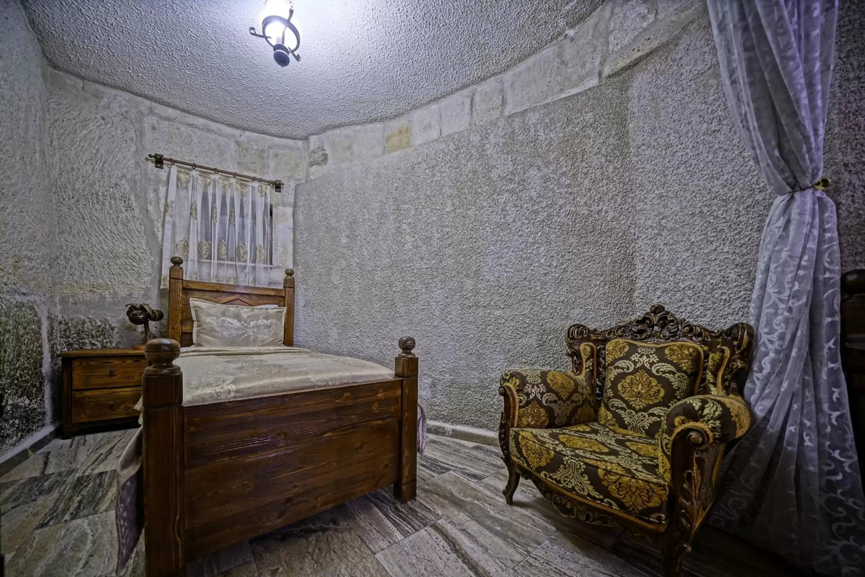 Bedroom in Maccan Cave Hotel