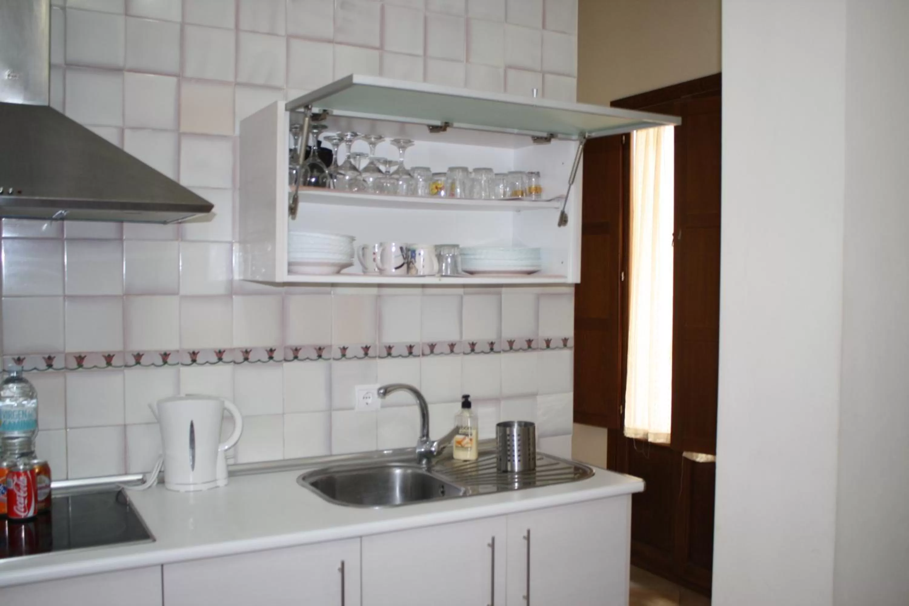 Kitchen or kitchenette in Abadia Suites