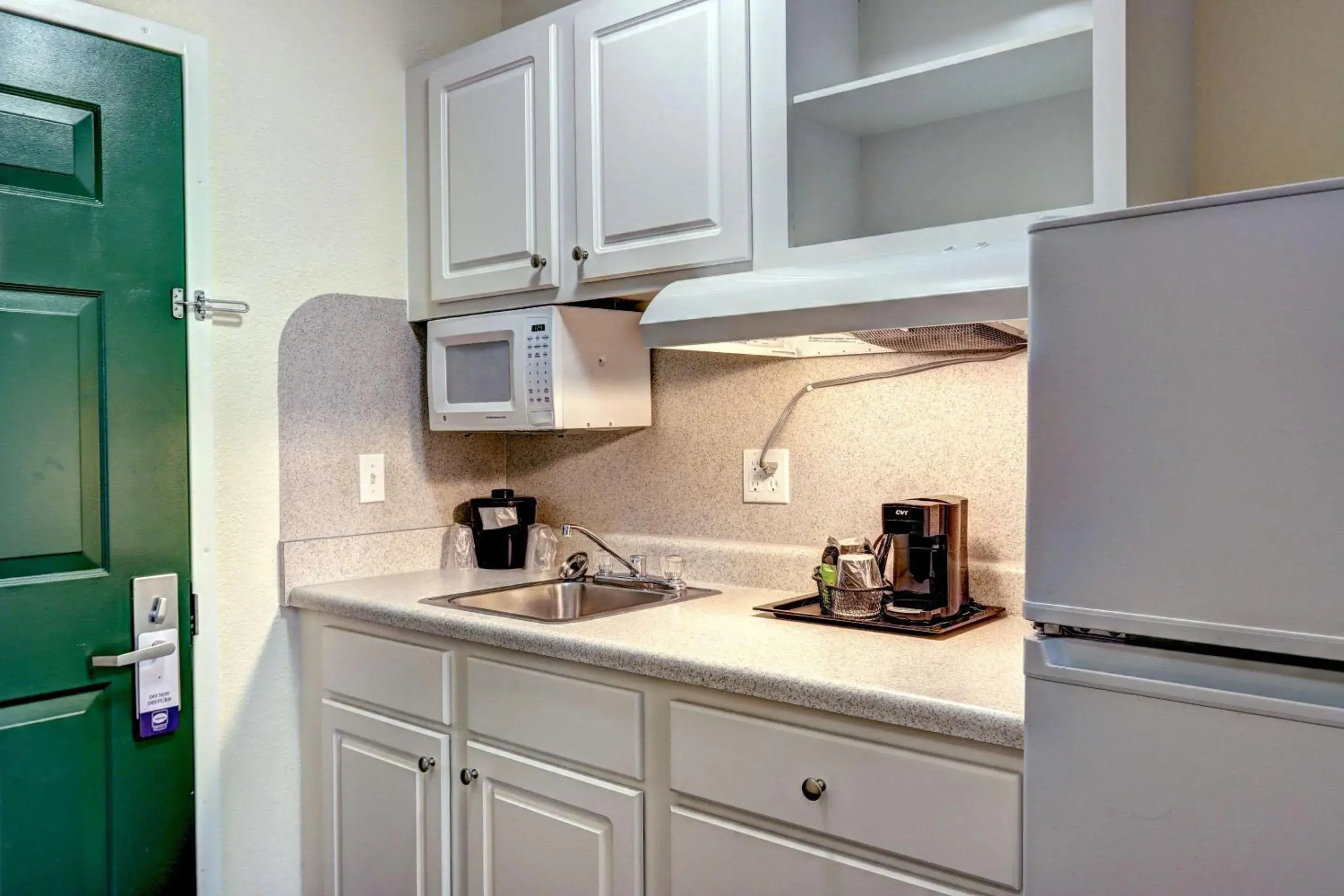 Photo of the whole room, Kitchen/Kitchenette in Suburban Studios Westminster Denver North