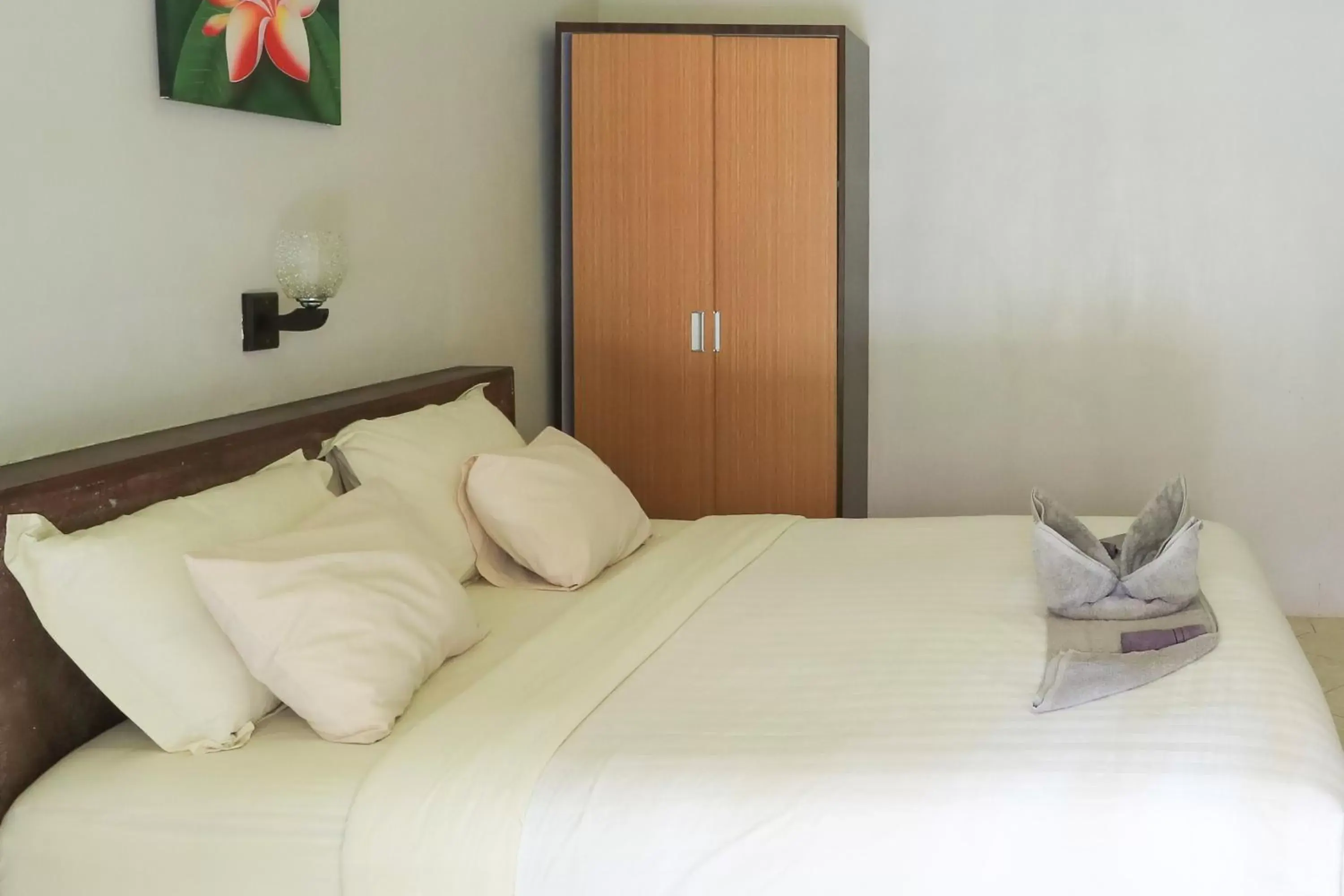 Bedroom, Bed in Senggigi Cottages Lombok