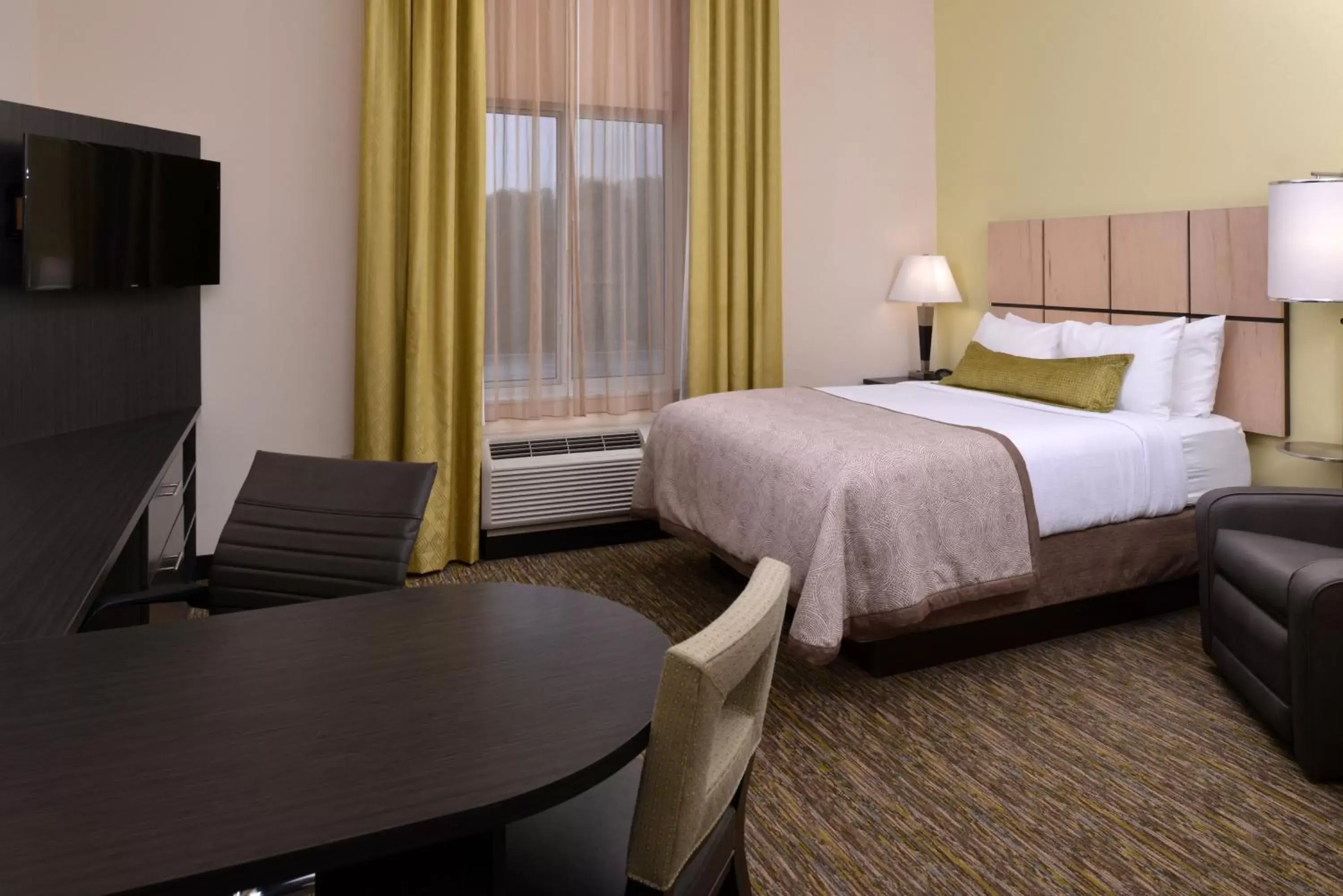 Photo of the whole room, Bed in Candlewood Suites MORGANTOWN-UNIV WEST VIRGINIA, an IHG Hotel