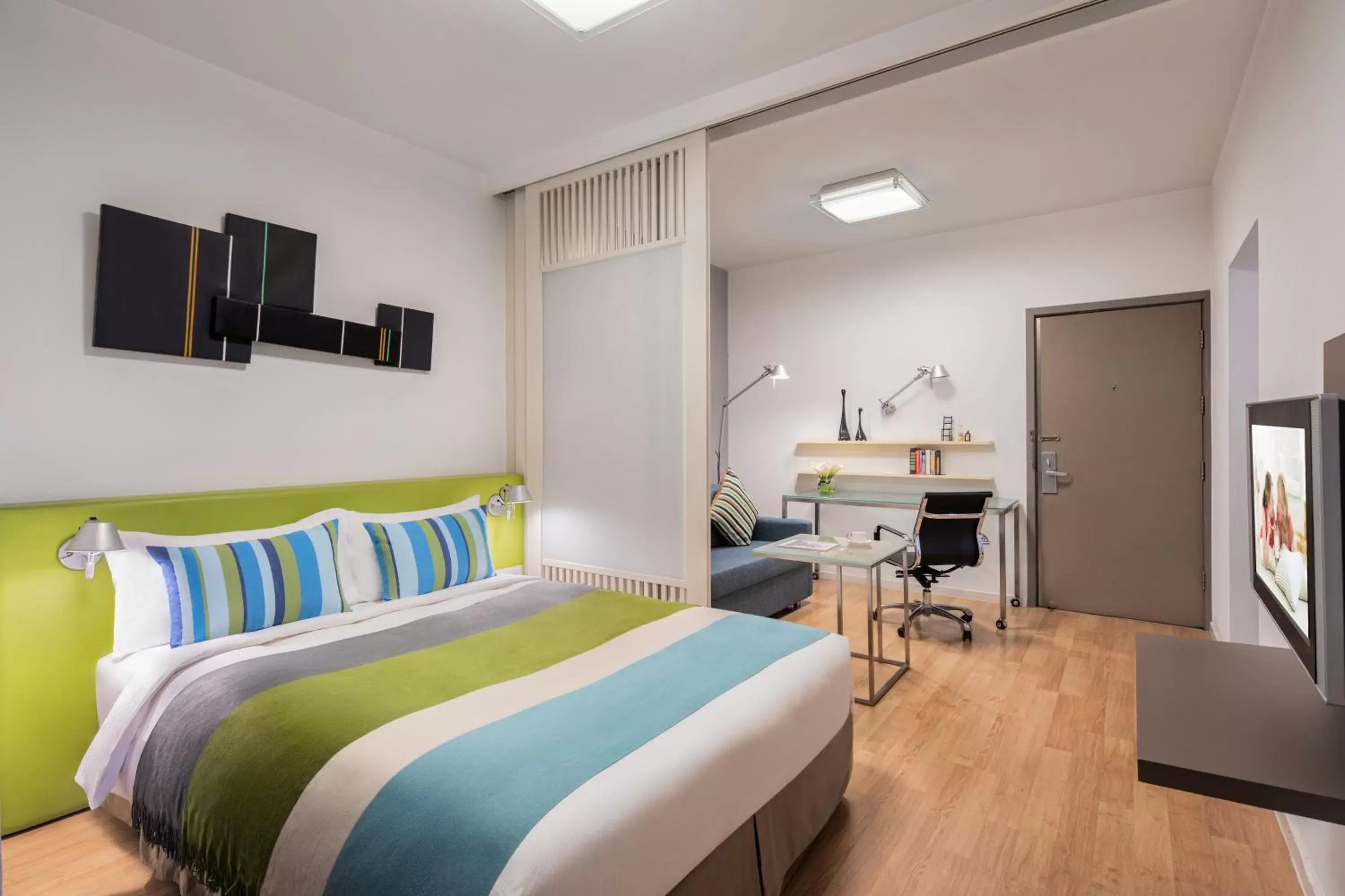 Photo of the whole room, Bed in Citadines Xinghai Suzhou Photo of the whole room, Bed in Citadines Xinghai Suzhou