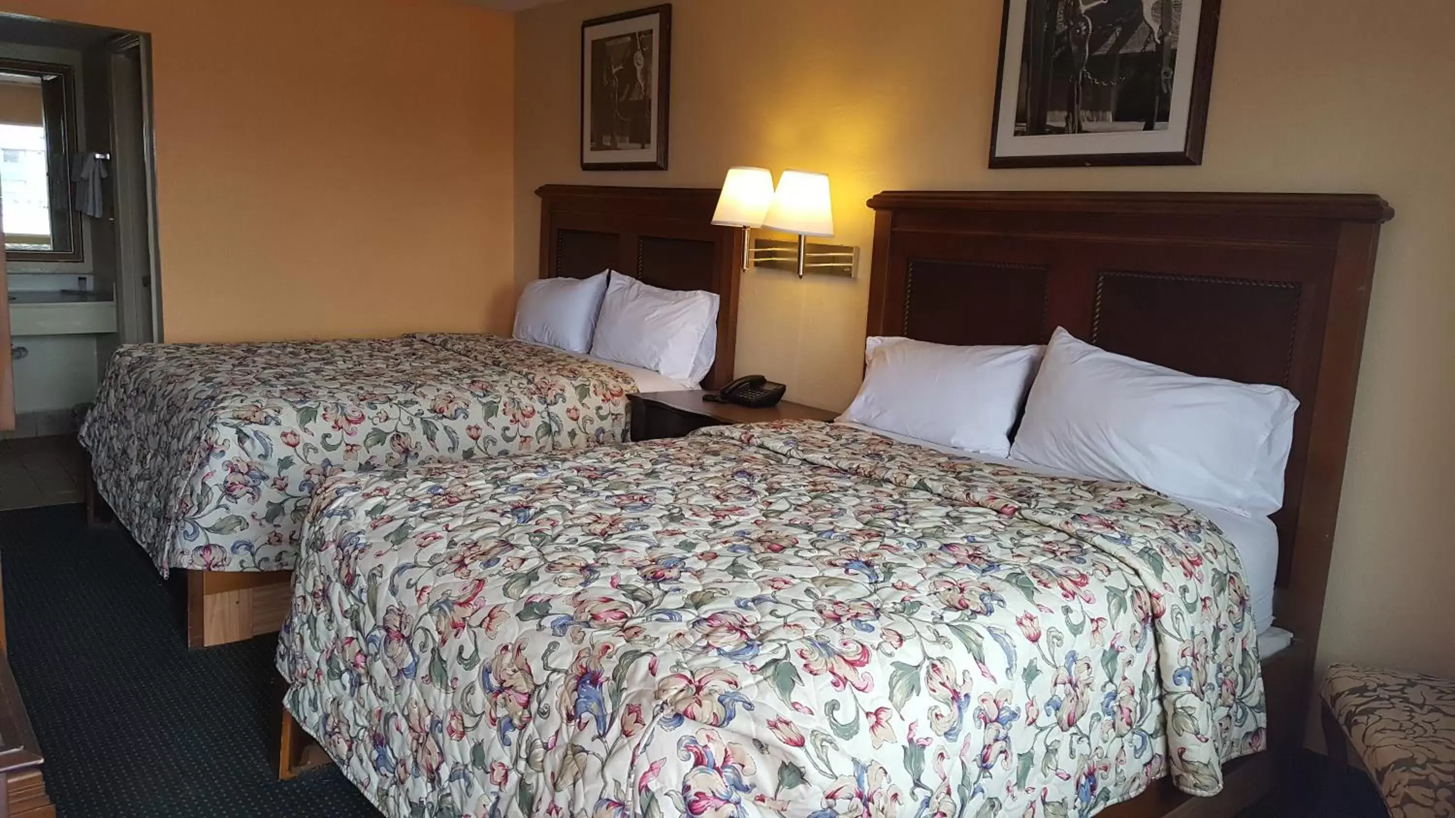 Bed in Garden Inn and Extended Stay