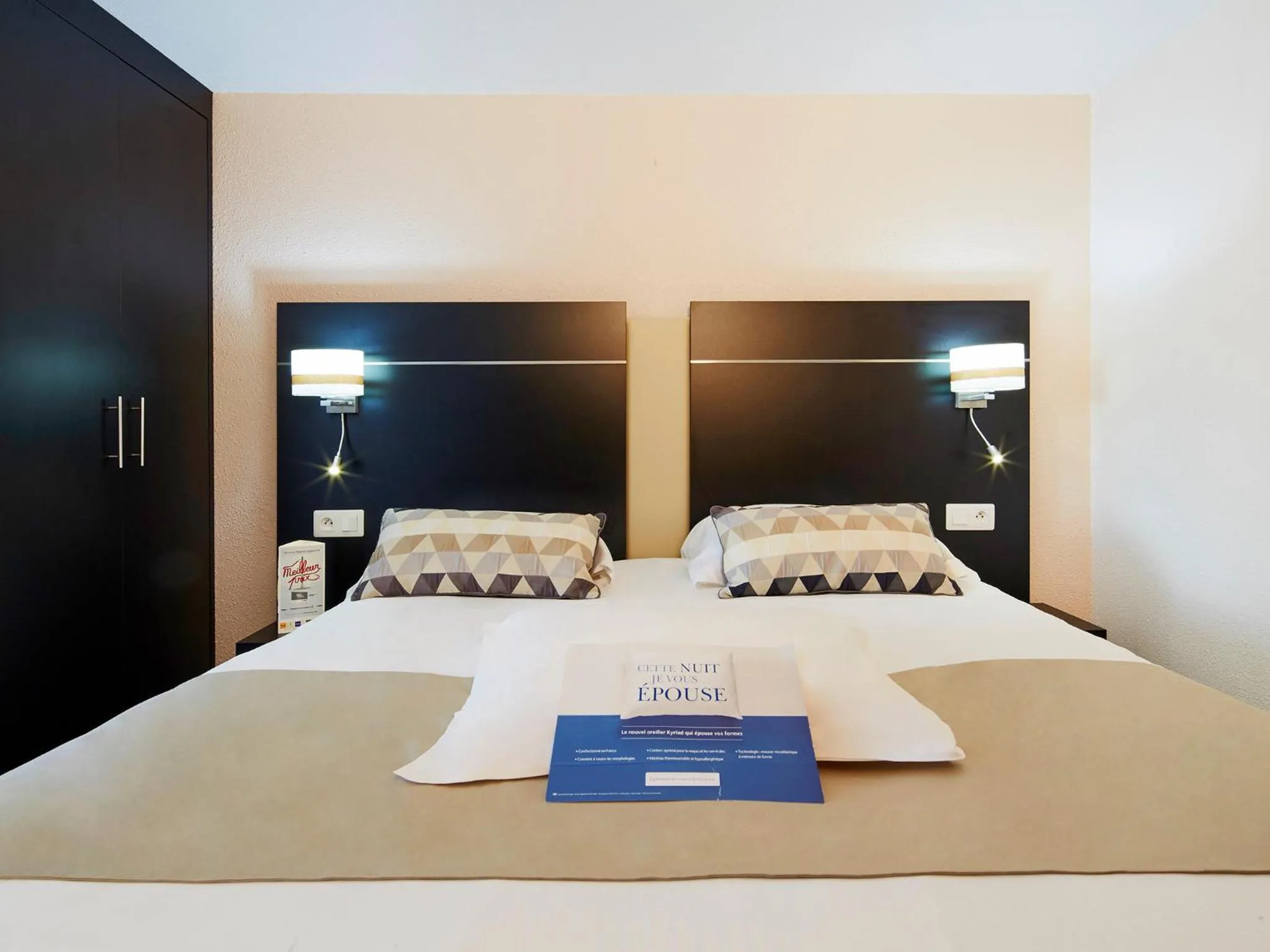 Bed in Kyriad Hotel Meaux