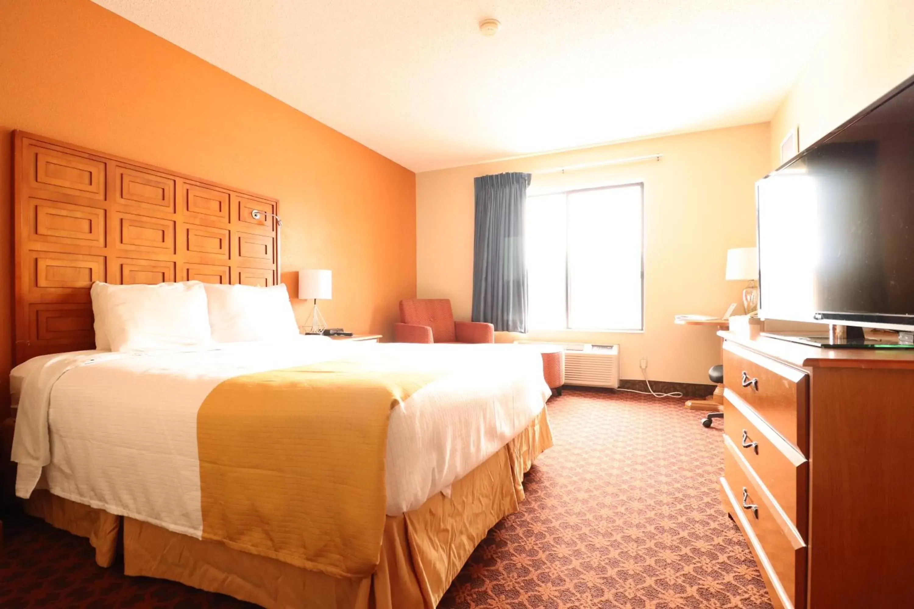 Bedroom in Days Inn by Wyndham Black River Falls - Access to ATV Trail