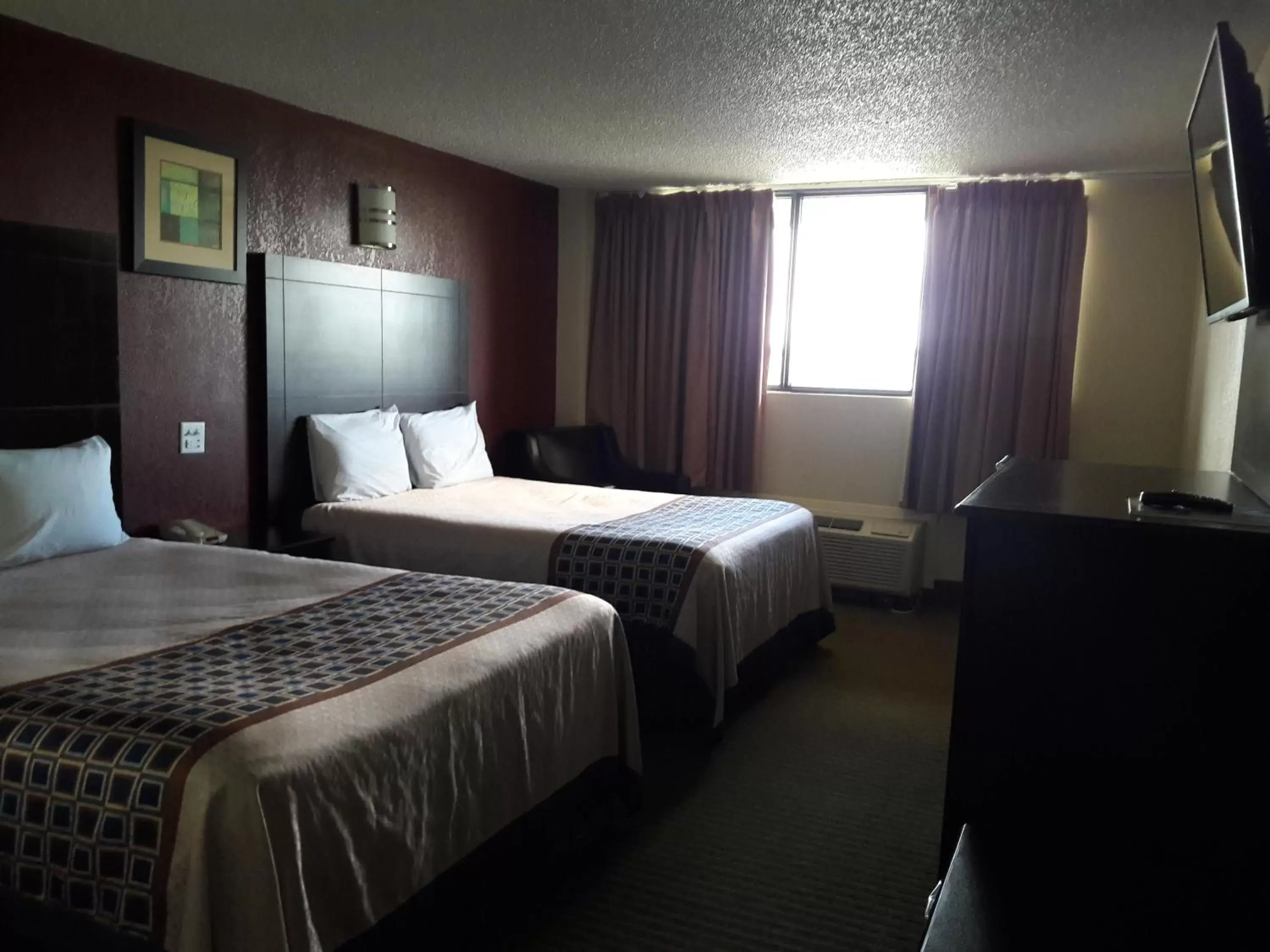 Bed in Americas Best Value Inn & Suites-Texas City/La Marque