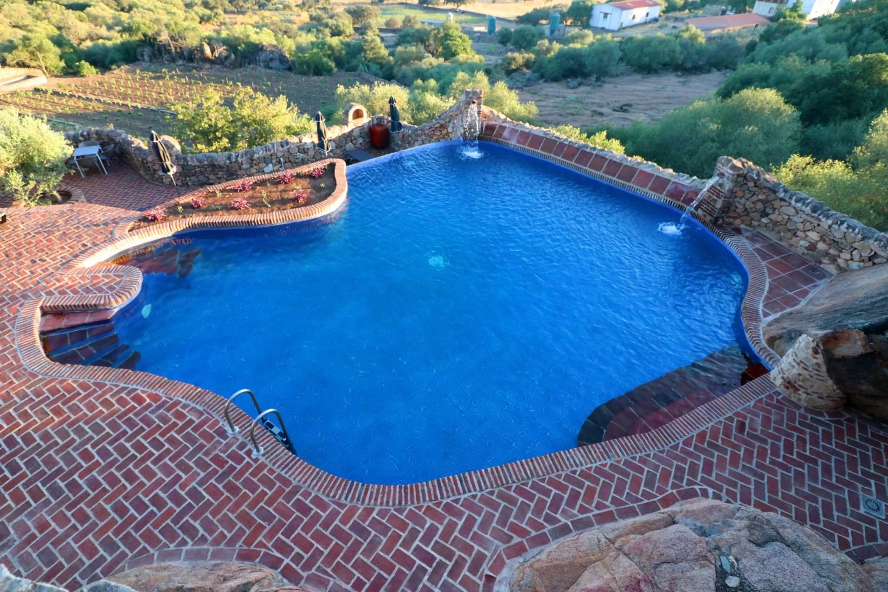 Swimming pool in Hotel Monasterio de Rocamador