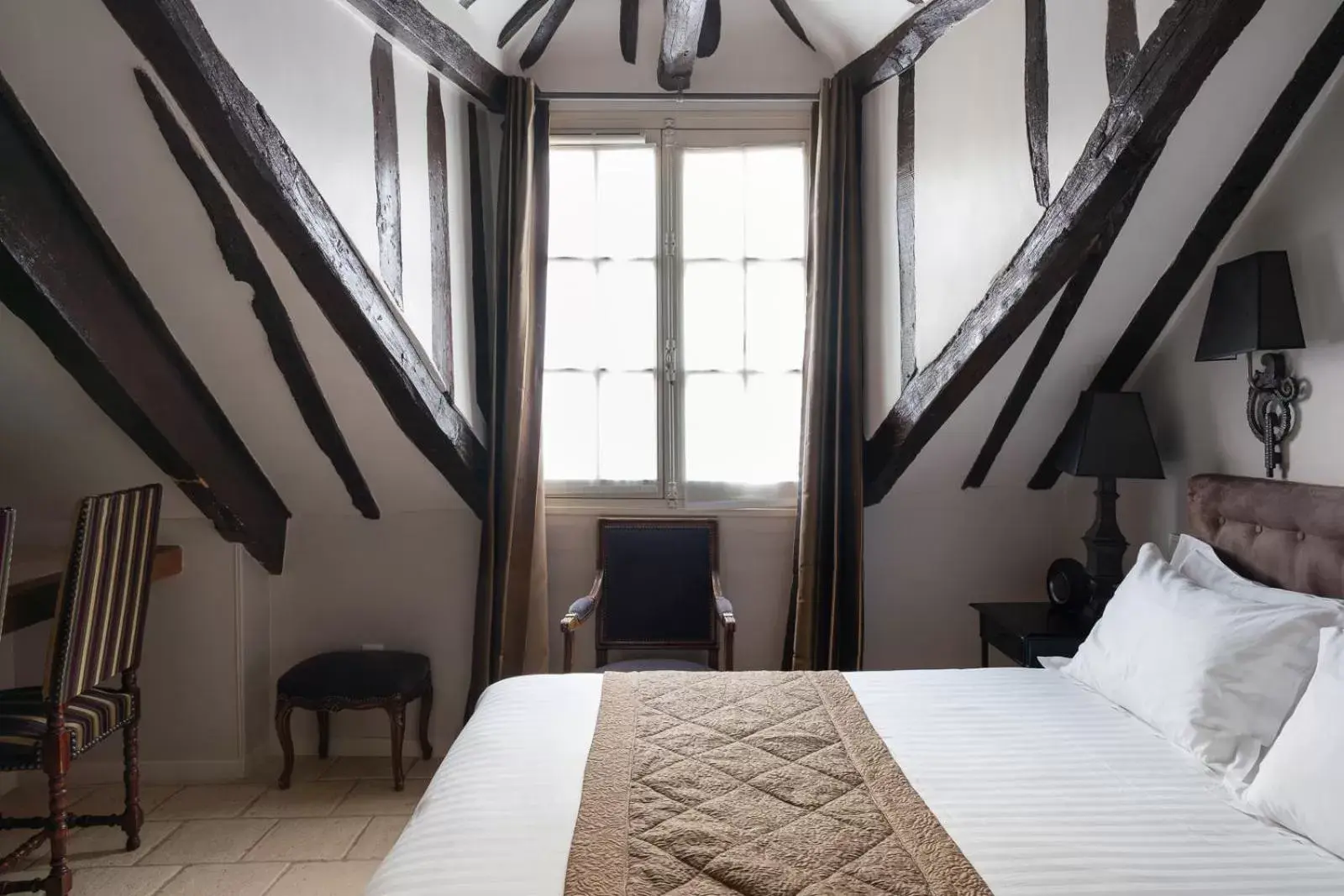 Bed in Hotel Saint-Louis Marais