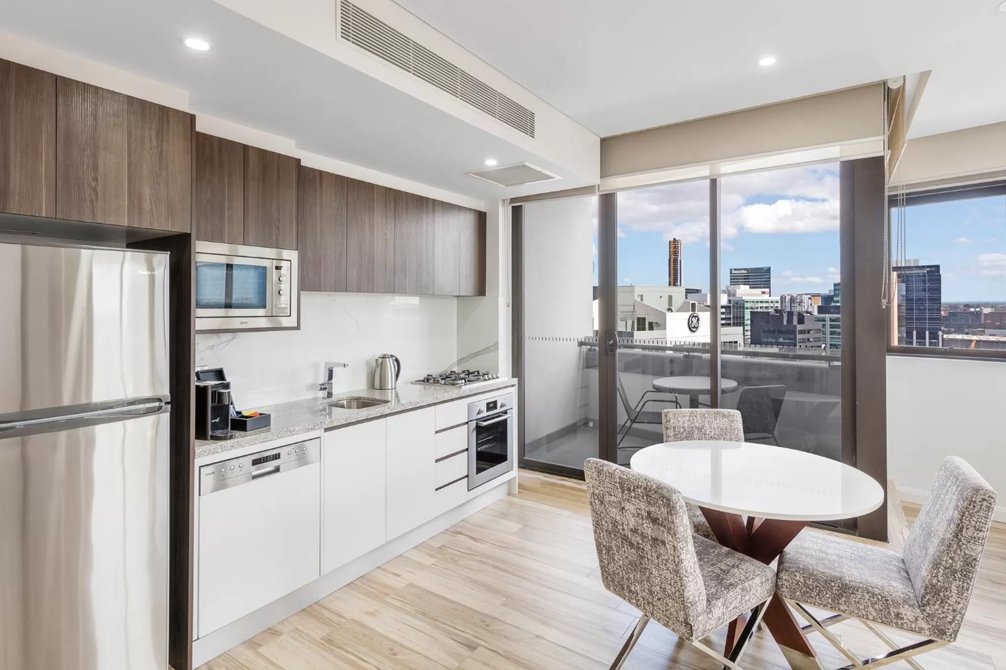 Kitchen or kitchenette in Meriton Suites Church Street, Parramatta