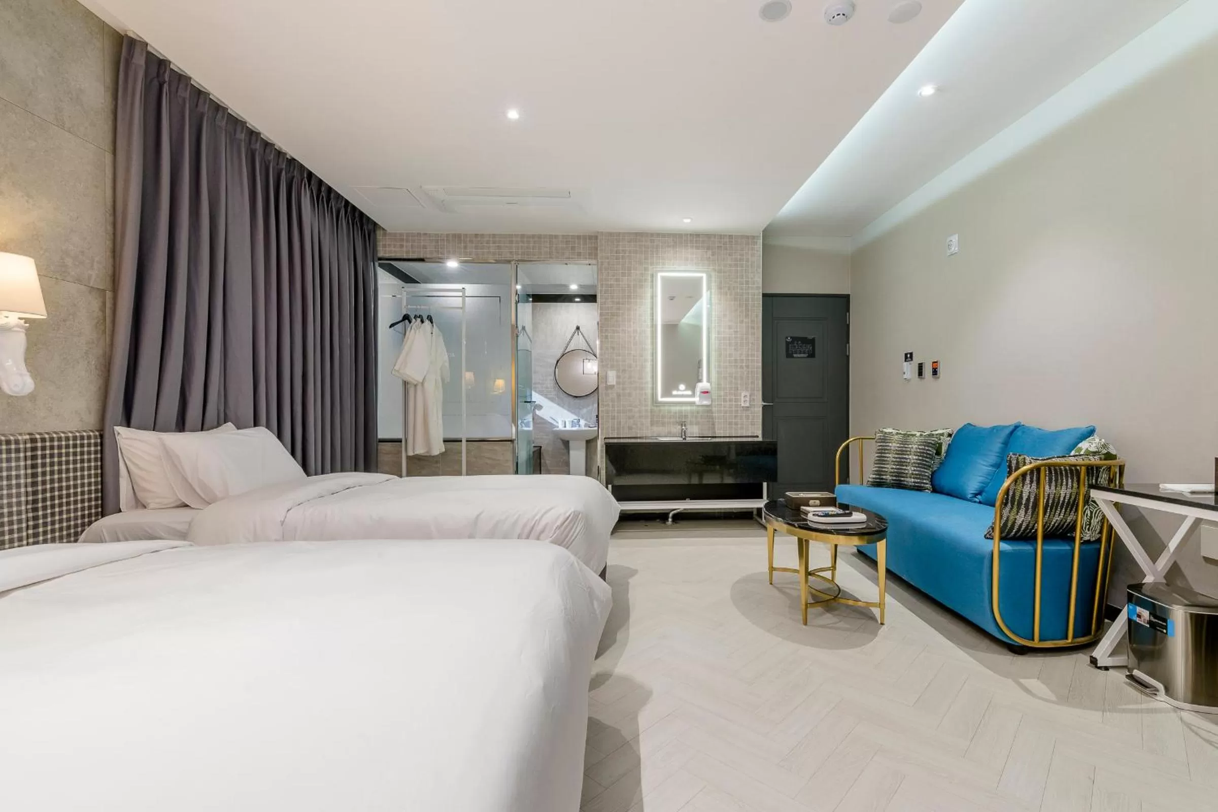 Photo of the whole room, Bed in Air Sky Hotel