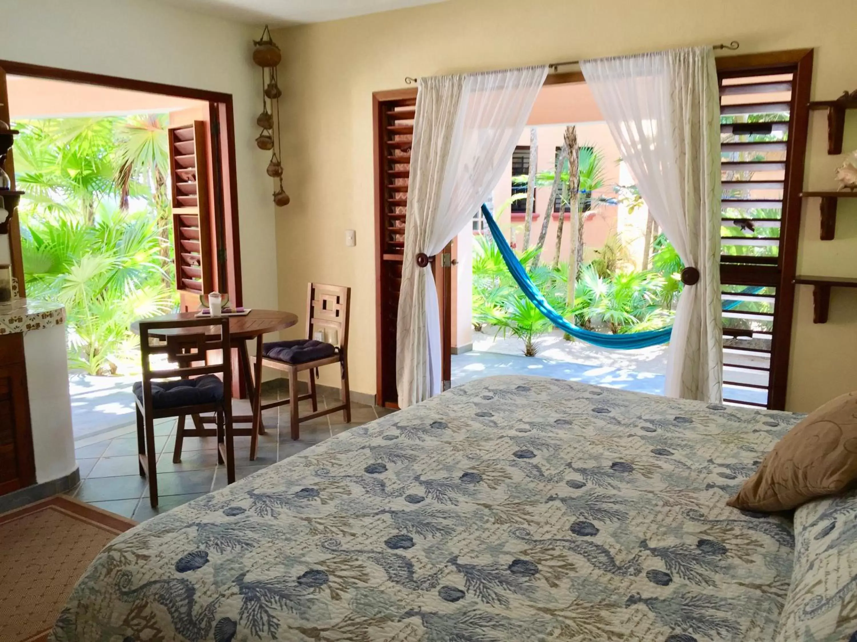 Bed in Nah Uxibal Villa and Casitas