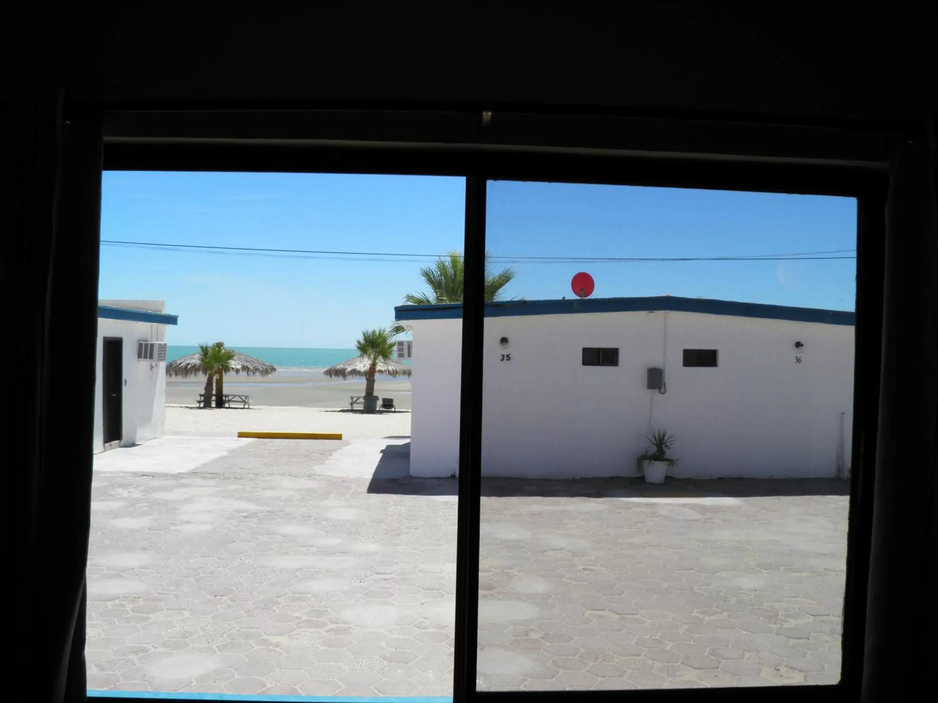 Balcony/Terrace in #52 Bungalow Seaside Hotel & Victors RV Park