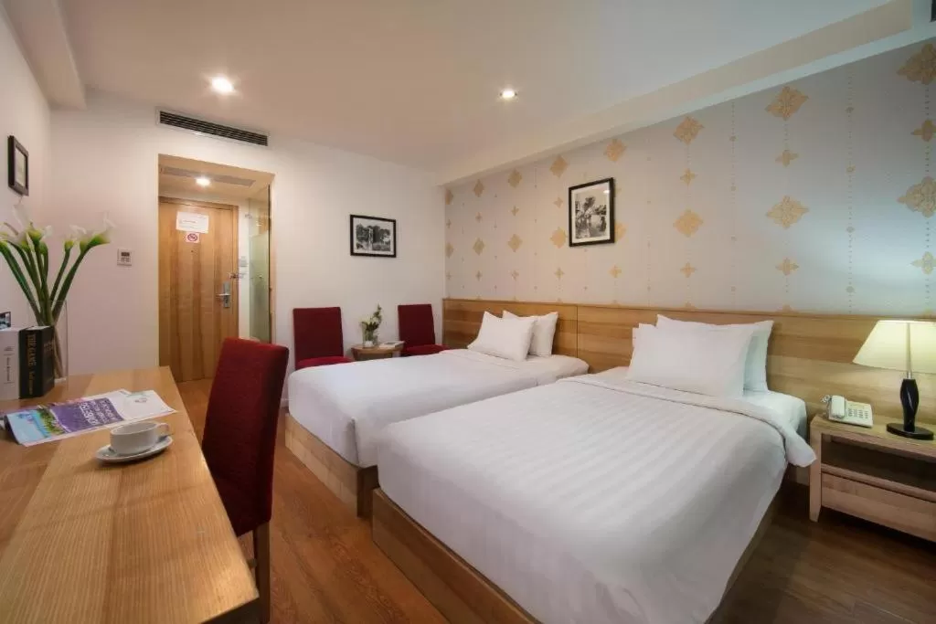 Bedroom, Bed in Aviary Hanoi Hotel & Travel