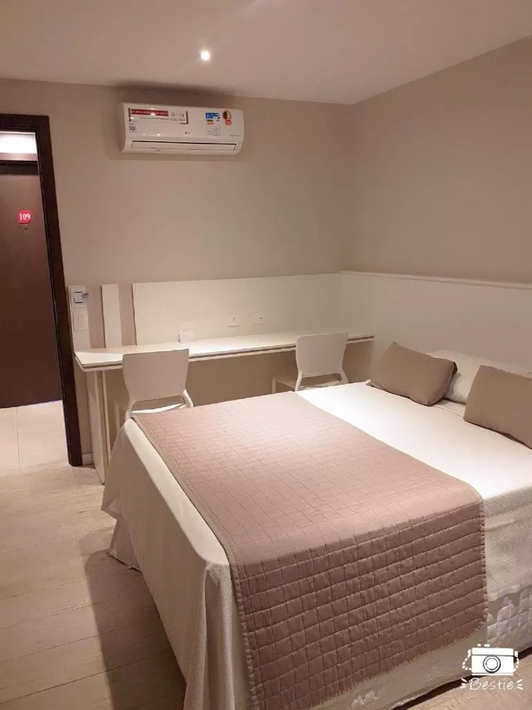 Bed in Jandira Premiêr Hotel