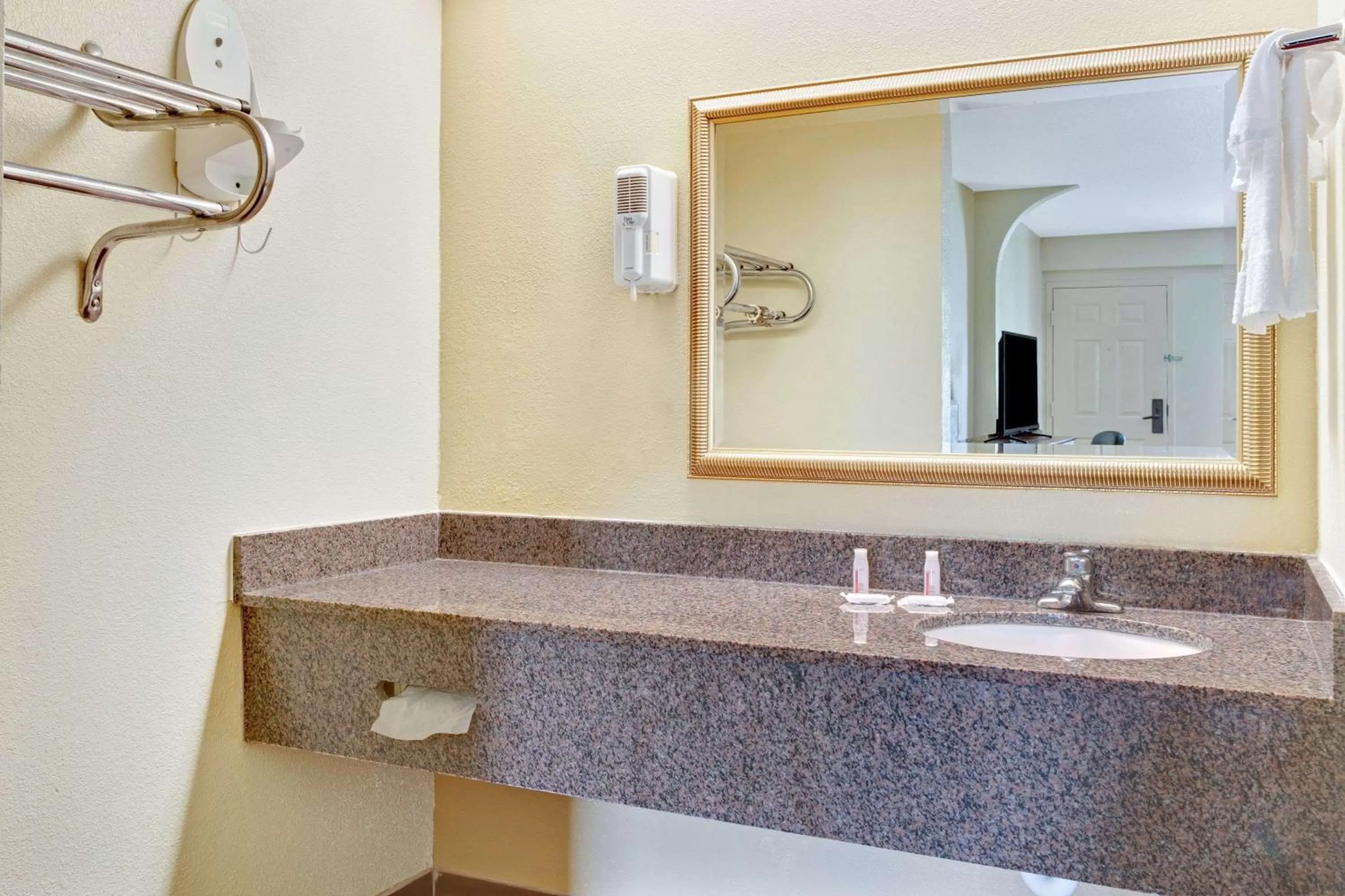 Bathroom in Days Inn & Suites by Wyndham Stockbridge South Atlanta