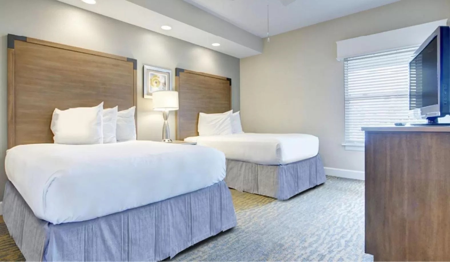 Guests, Bed in Summer Bay Orlando by Exploria Resorts