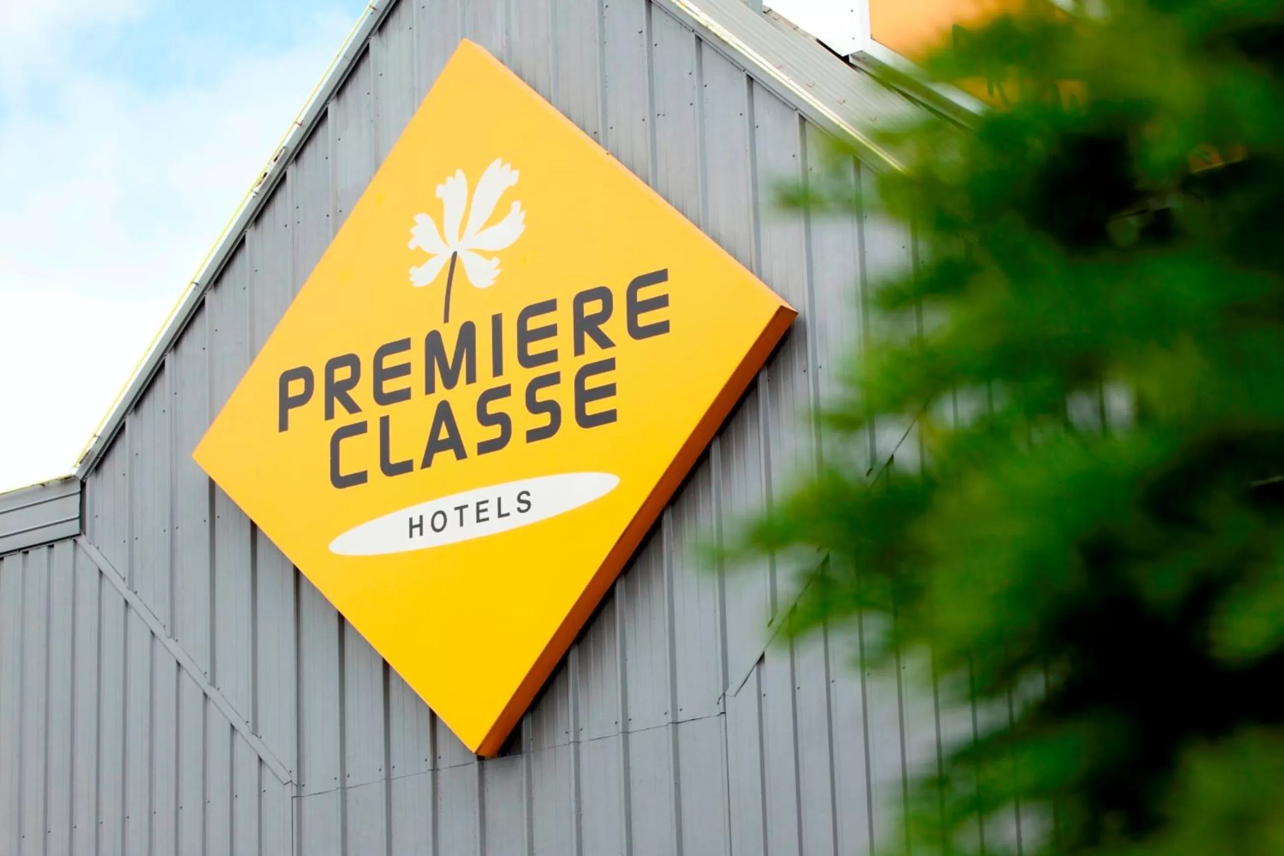 Property logo or sign in Premiere Classe Besancon Ecole Valentin