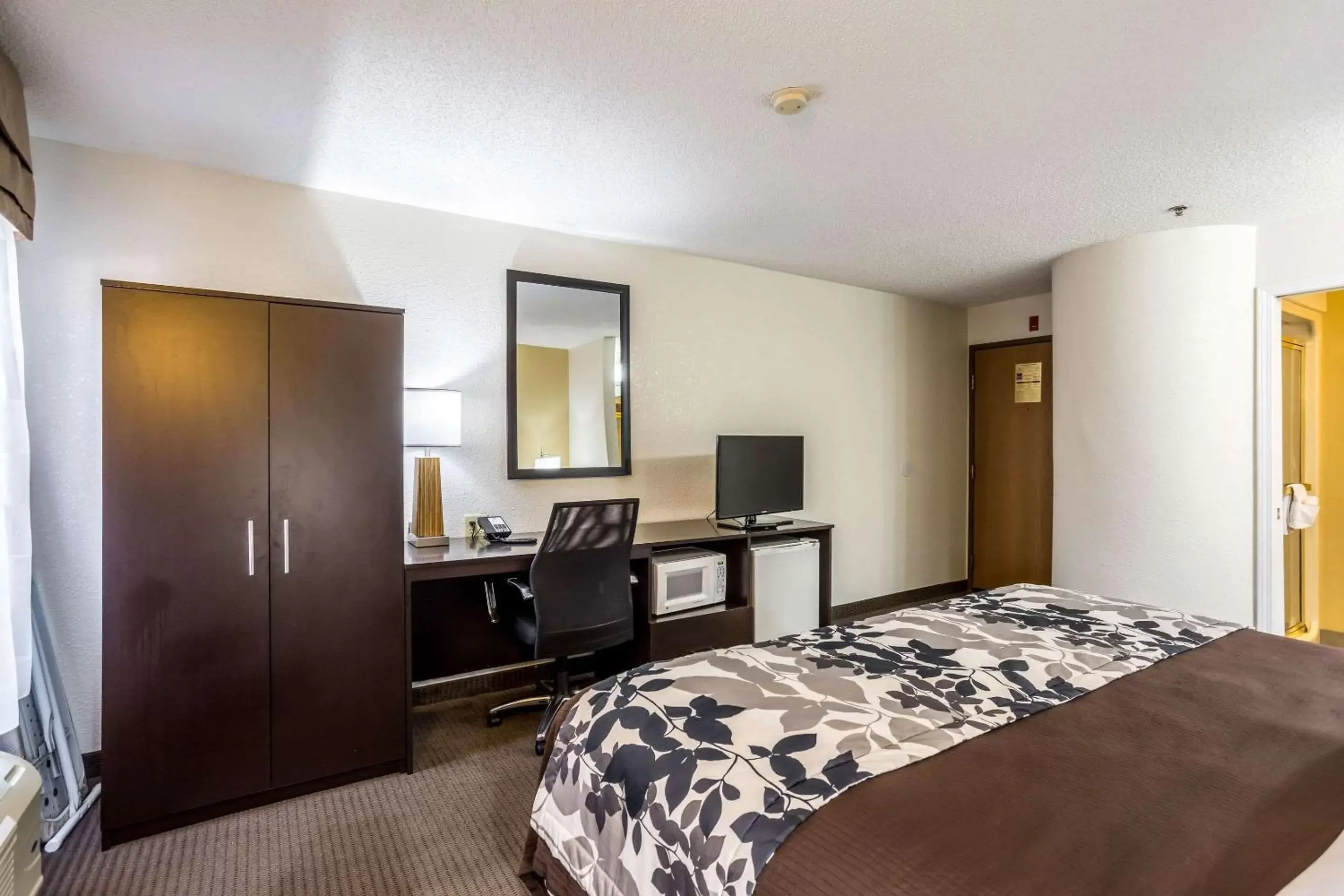 Photo of the whole room, TV/Entertainment Center in Sleep Inn Owensboro