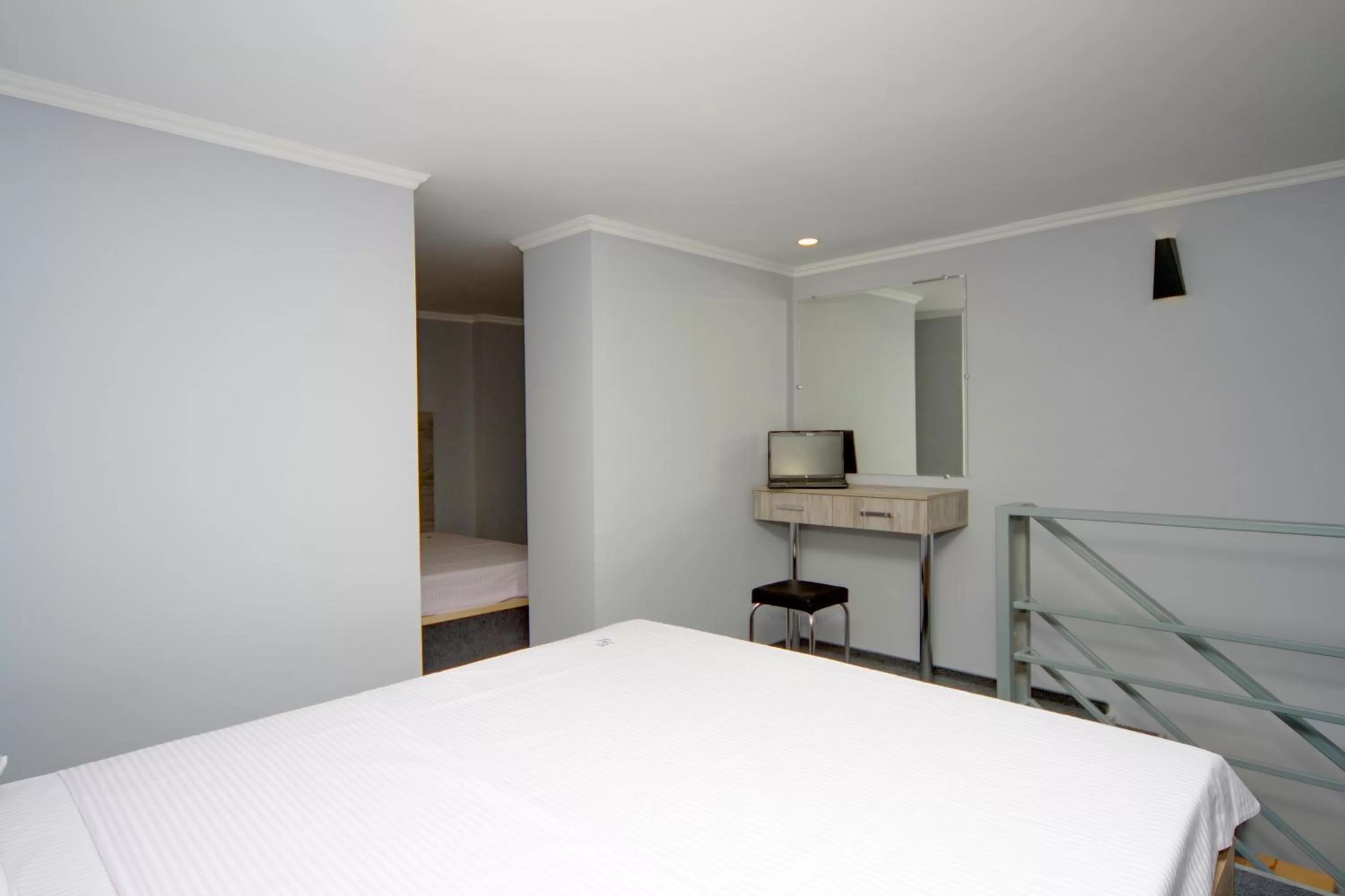 Bed in Grand Apartments