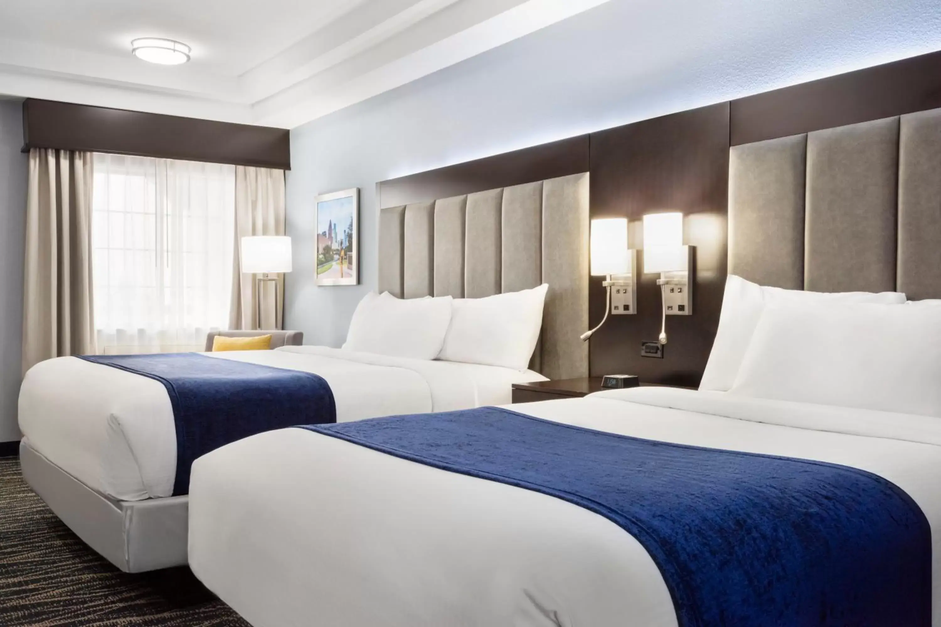 Bedroom, Bed in Days Inn & Suites by Wyndham Houston Hobby Airport