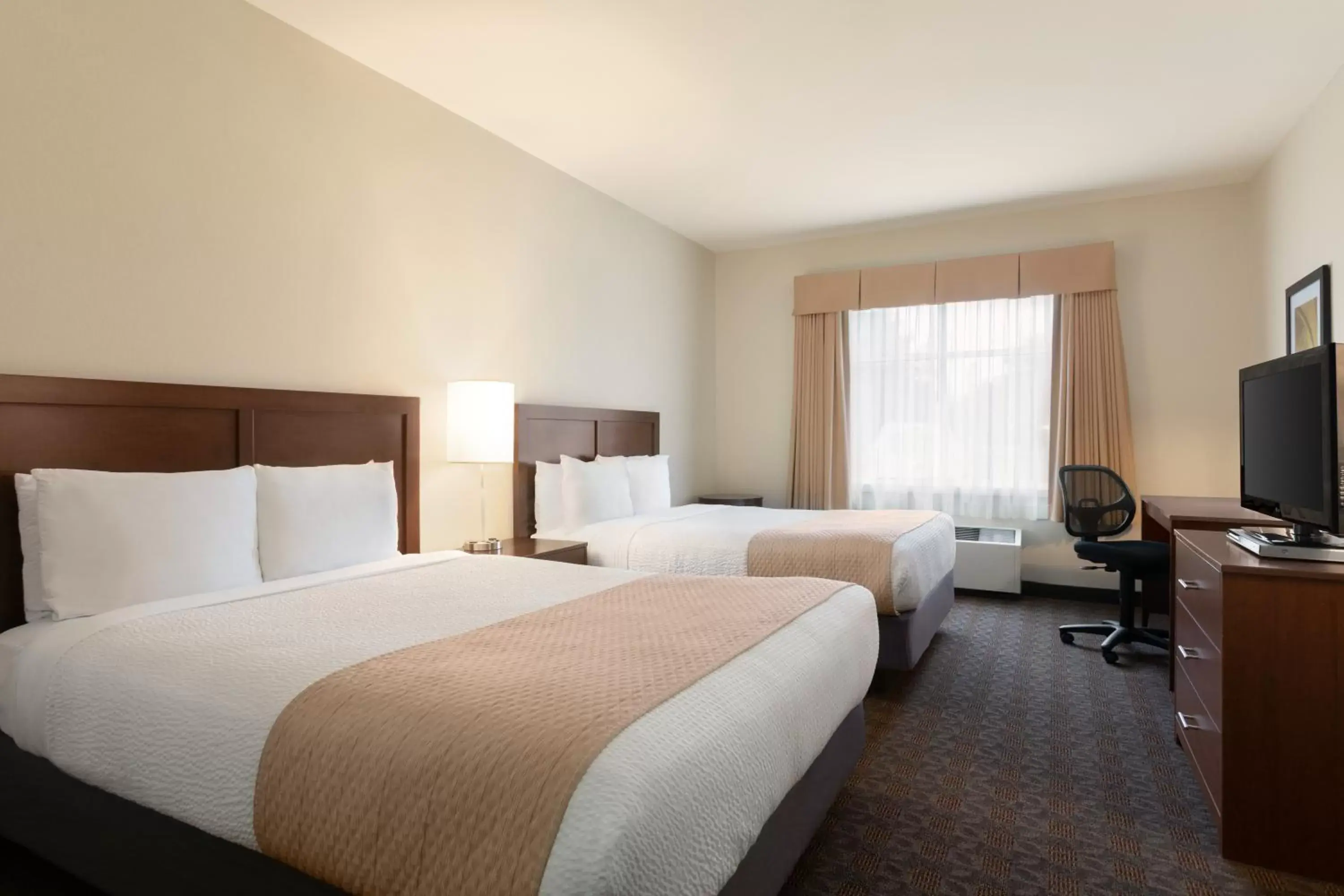 Bedroom in Days Inn by Wyndham Ottawa Airport