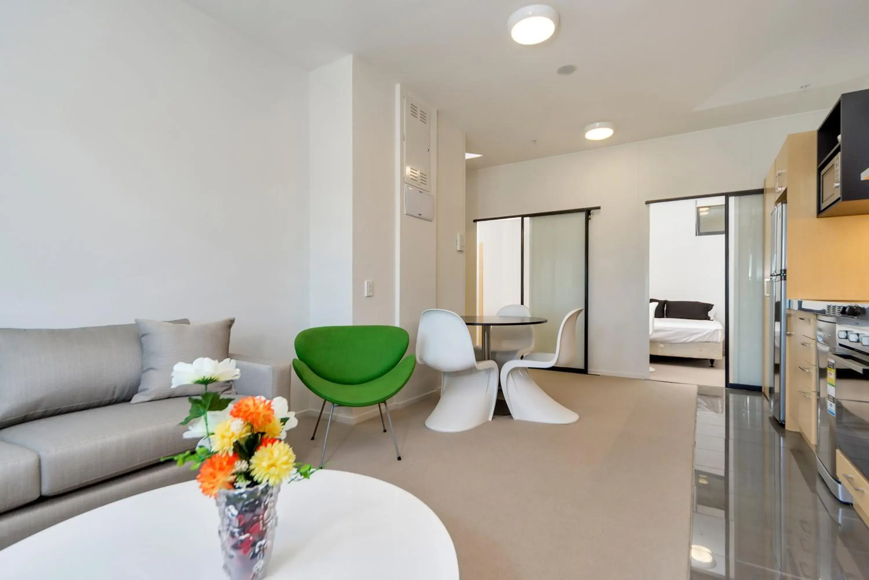 Kitchen or kitchenette, Seating Area in MCentral Apartments Manukau