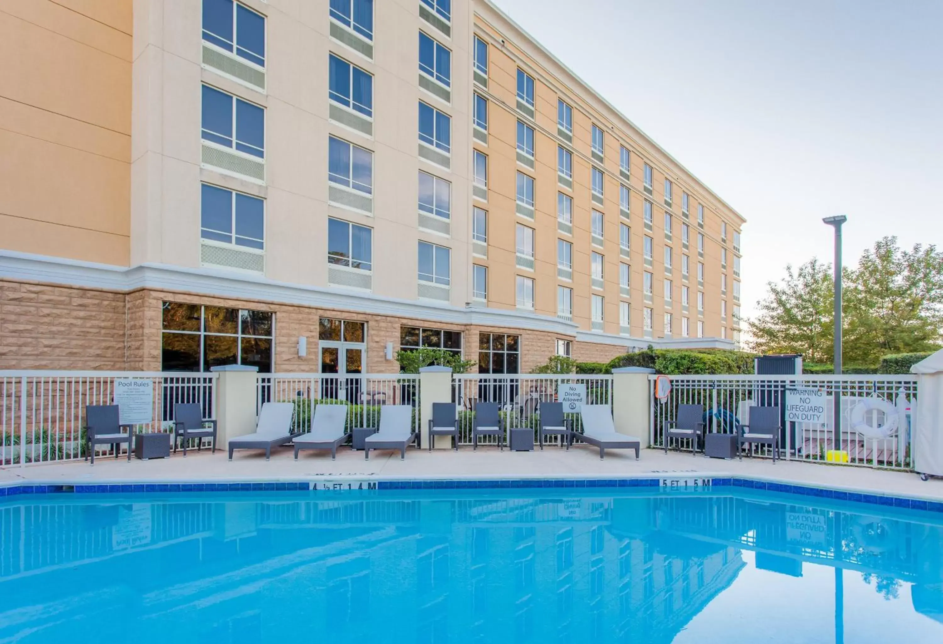 Swimming pool, Property Building in Holiday Inn Hotel & Suites Tallahassee Conference Center North, an IHG Hotel