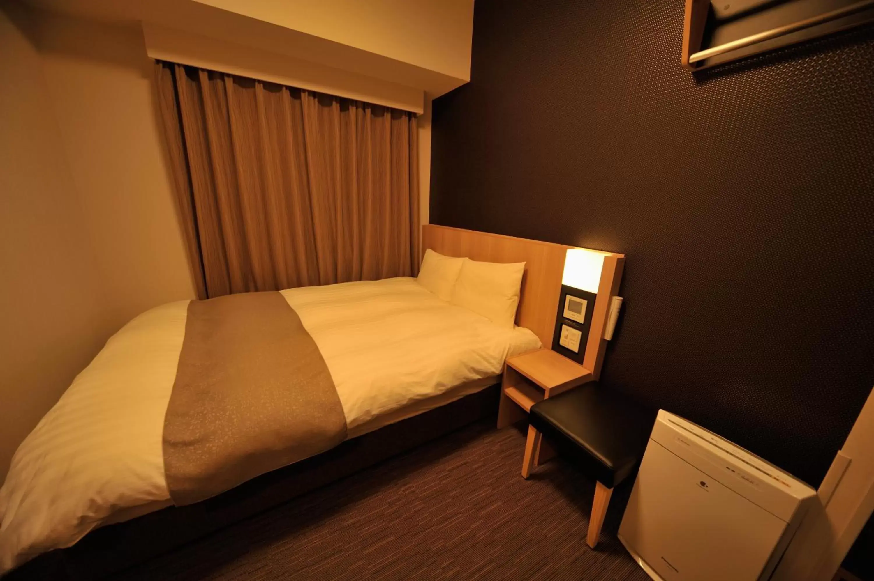 Bed in Dormy Inn Ueno Okachimachi