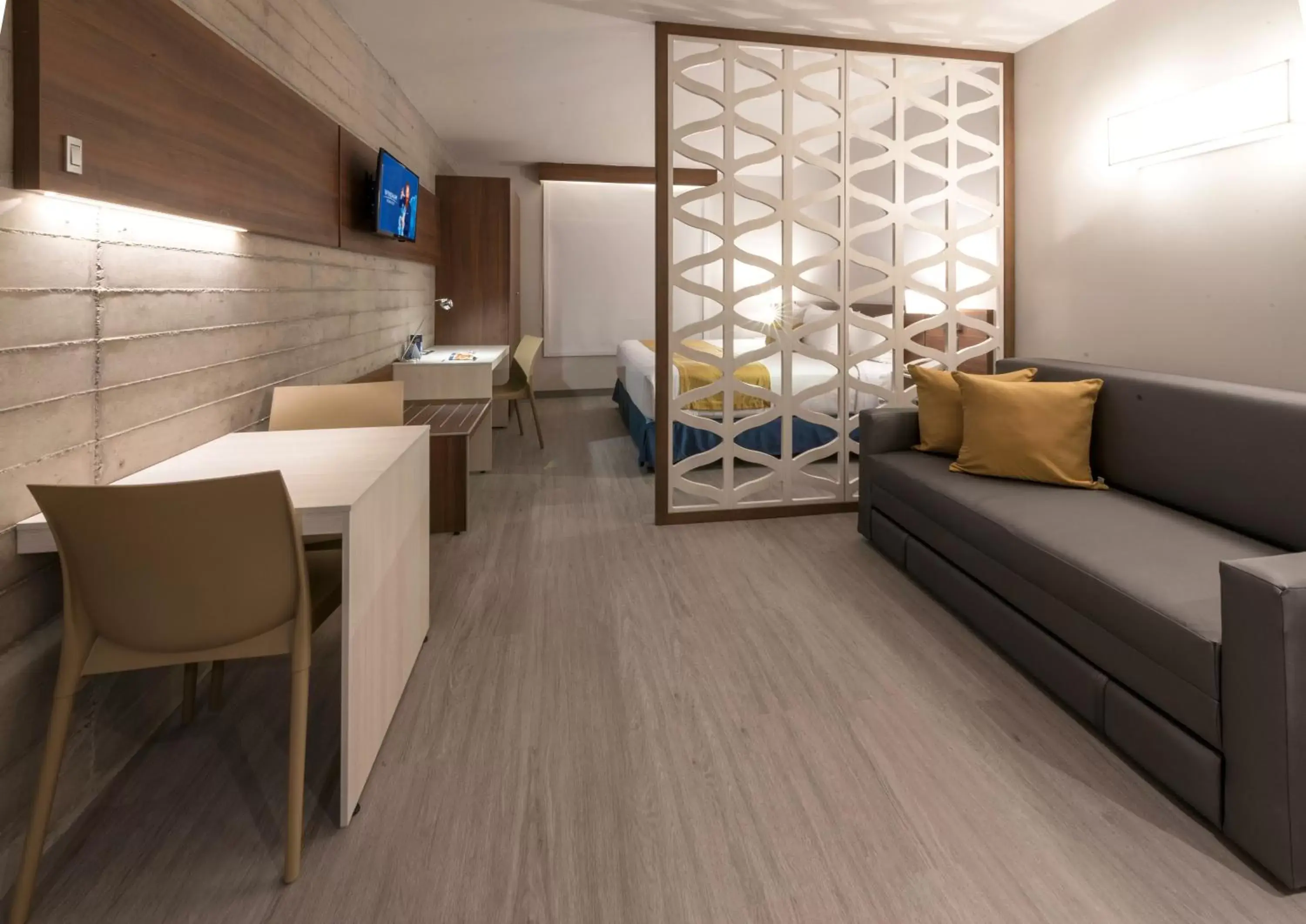 Bed, Seating Area in Microtel Inn & Suites by Wyndham Irapuato