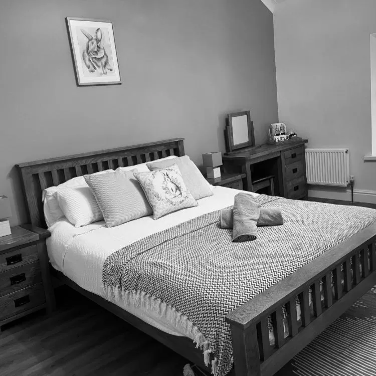 Bed in The Cottage Inn