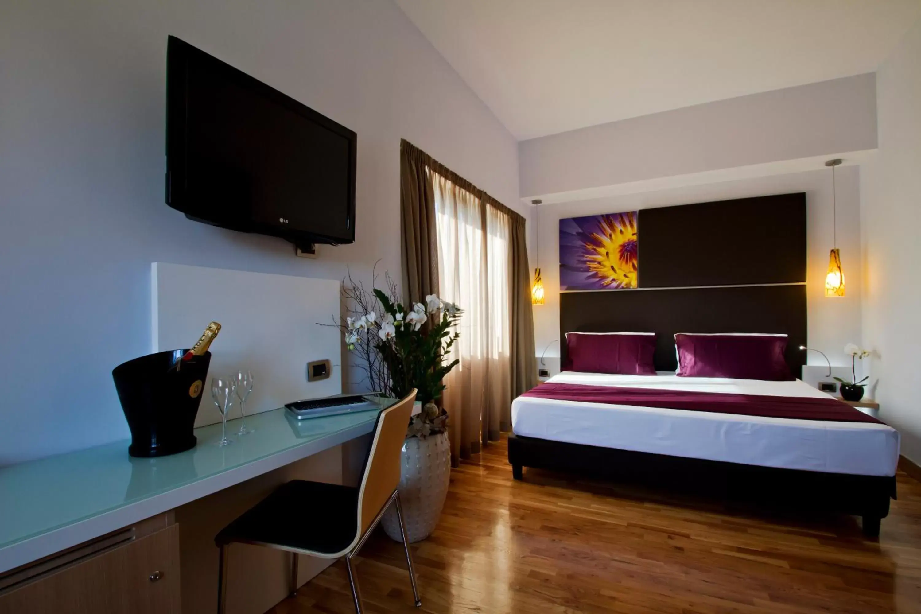 Bed, TV/Entertainment Center in Hotel Gravina San Pietro
