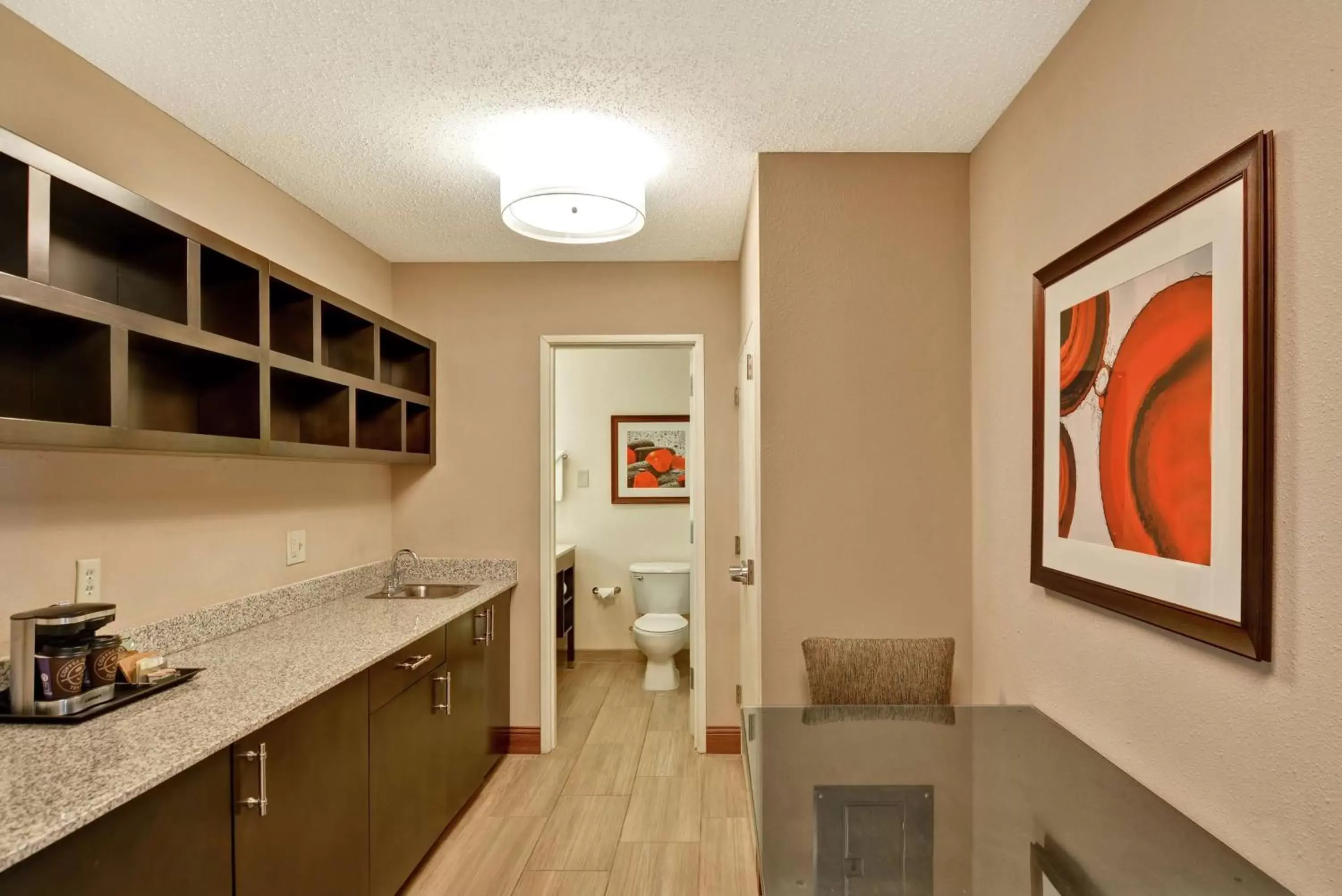 Photo of the whole room, Kitchen/Kitchenette in DoubleTree by Hilton Hattiesburg, MS